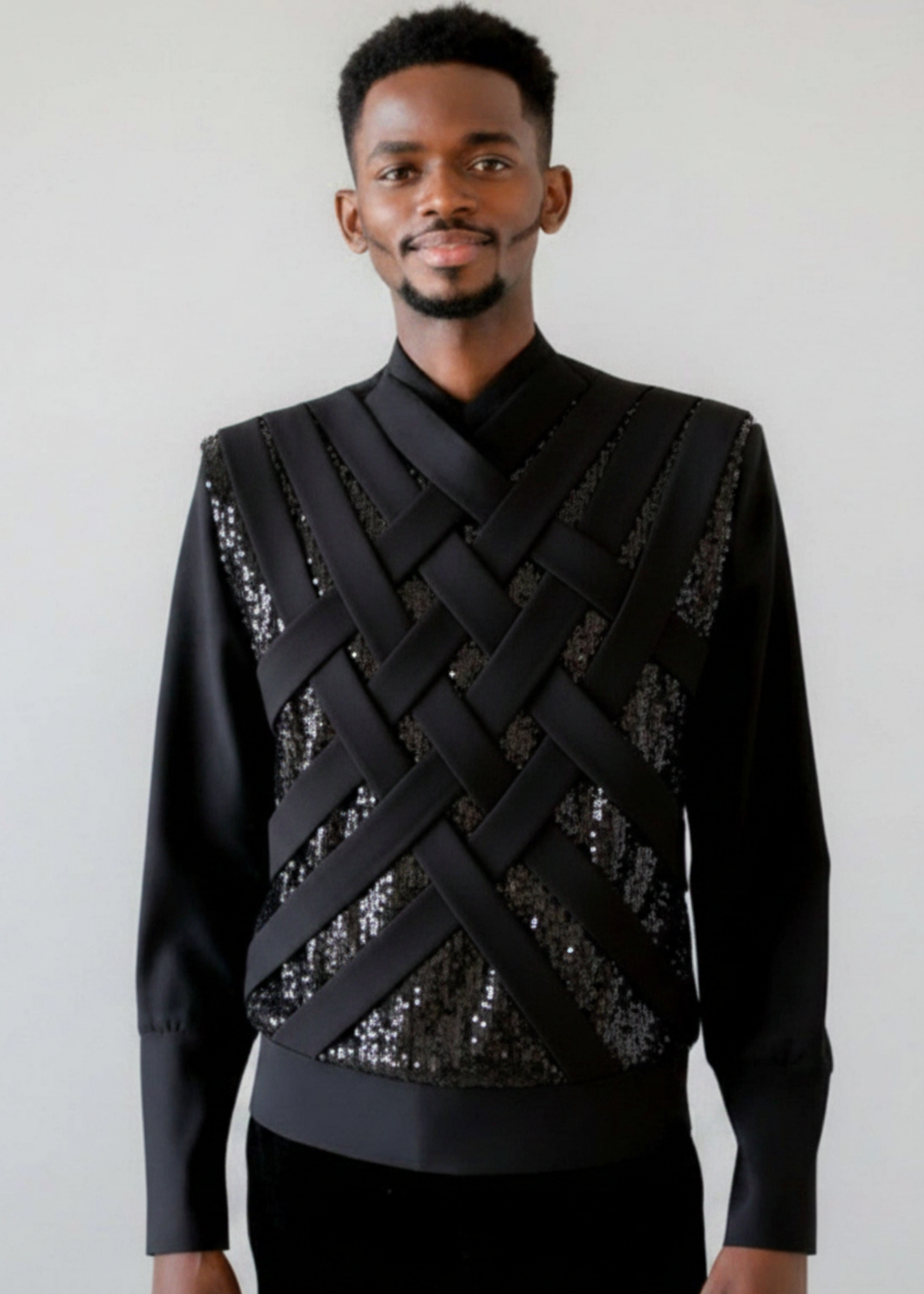 Stacy Stewart Smith Men's Argyle Labyrinth Sequined Black Knit Top with black sequins on mannequin 6'3" front view with gray backdrop.