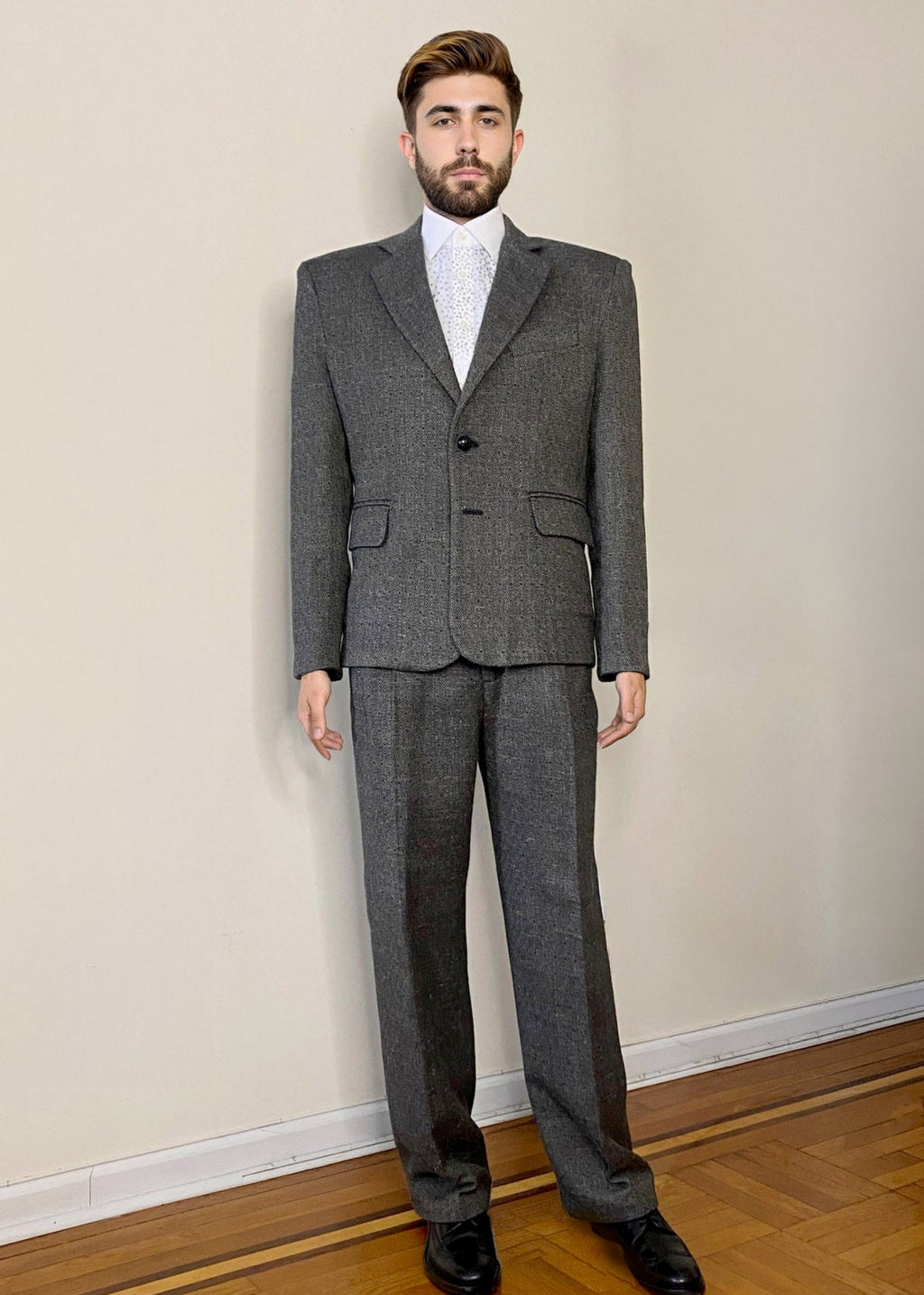 Stacy Stewart Smith Men's Diamond Dodger Tailored 3-Piece Tweed Suit on a mannequin 6'3" front view w/o cloke in a room with an antique white wall, wooden floor.