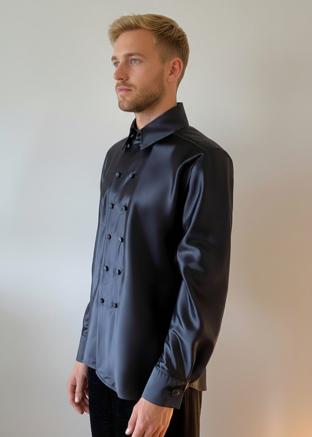 Stacy Stewart Smith Men's Onyx Duex Fois Poly Satin Shirt on a male mannequin 6'3 frontal 3/4 view against an antique white wall.