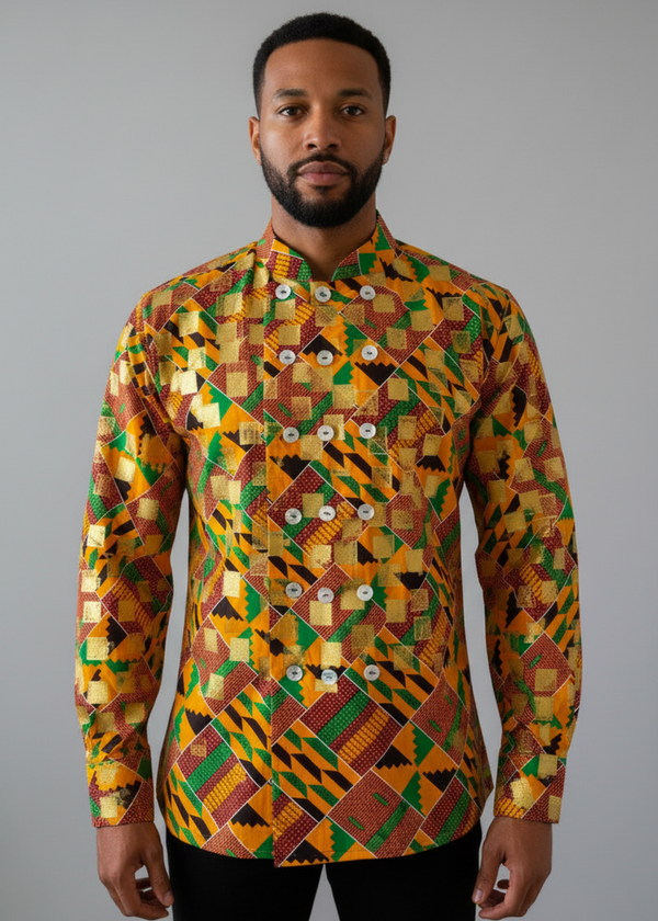 Stacy Stewart Smith's Noble Kente long-sleeve button-up premium cotton Kente cloth dress shirt with manadarin collar, long sleeve gold metallic hand pixel over-printing with natural shell buttons displayed on a male model torso front view against a plain wall.