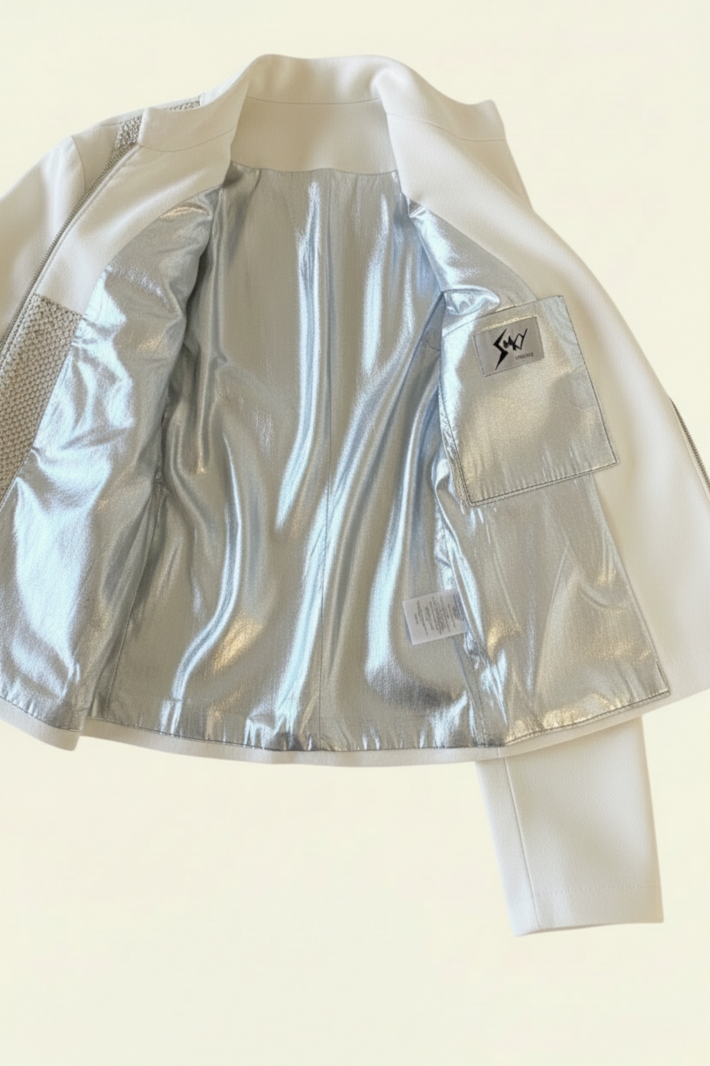 Stacy Stewart Smith Men's White Python & Denim Bellhop Jacket floating flat front view open silver lining with antique white wall backdrop.