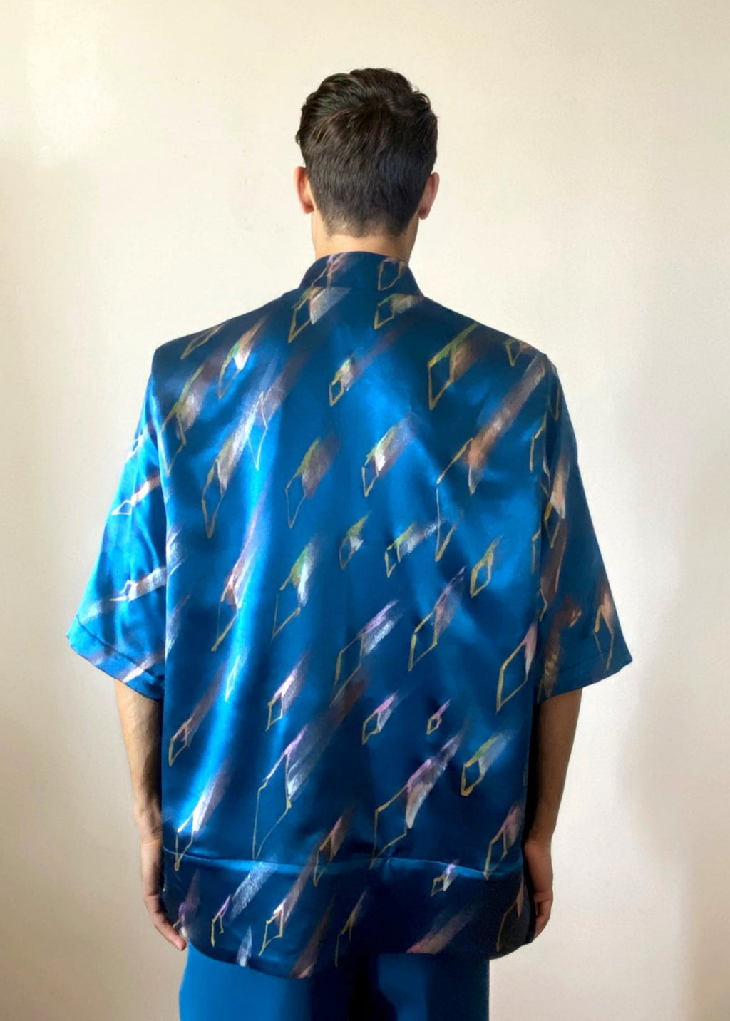 Stacy Stewart Smith Men's Rhombus Shower Hand-Painted Pool Shirt-Jacket on mannequin 6'3" back view.