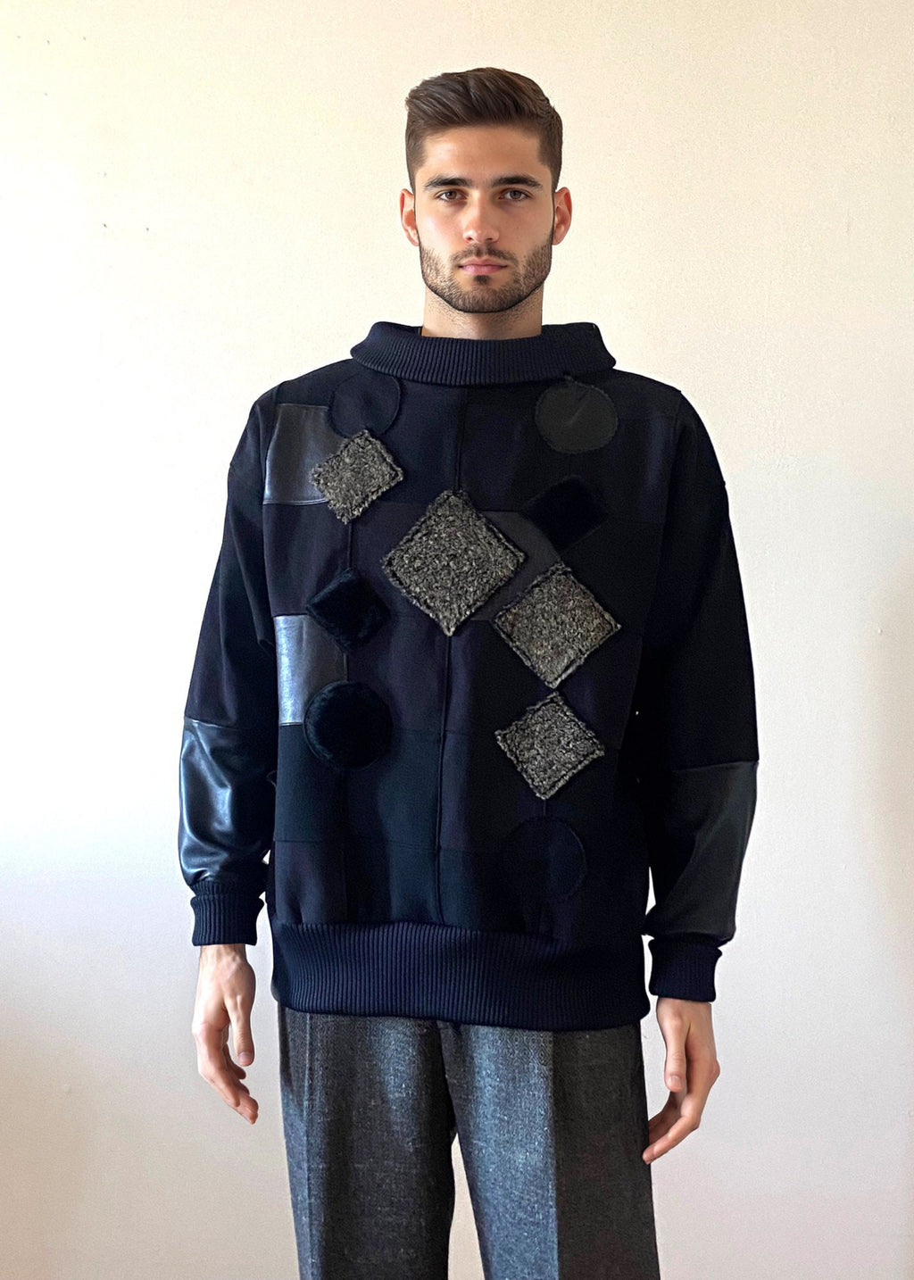 Stacy Stewart Smith Men's Black Harlequin Patch Sweatshirt on mannequin 6'3" frontal view mock neck down.