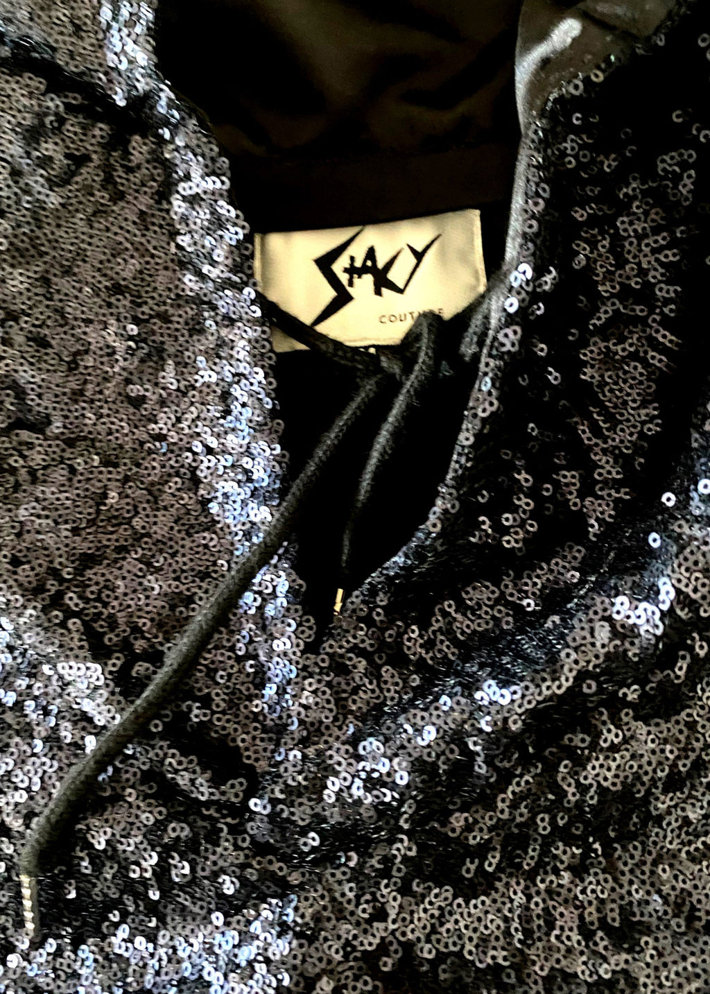 Stacy Stewart Smith Men’s Sequin and Hand-Printed Pixels Knight-Shirt on hanger zoomed neckline view showing brand label.