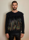 Stacy Stewart Smith Men's Pennaceous Beaded Black Boiled Wool Sweater with peacock, quail and rooster feathers front view  against an ivory backdrop. 