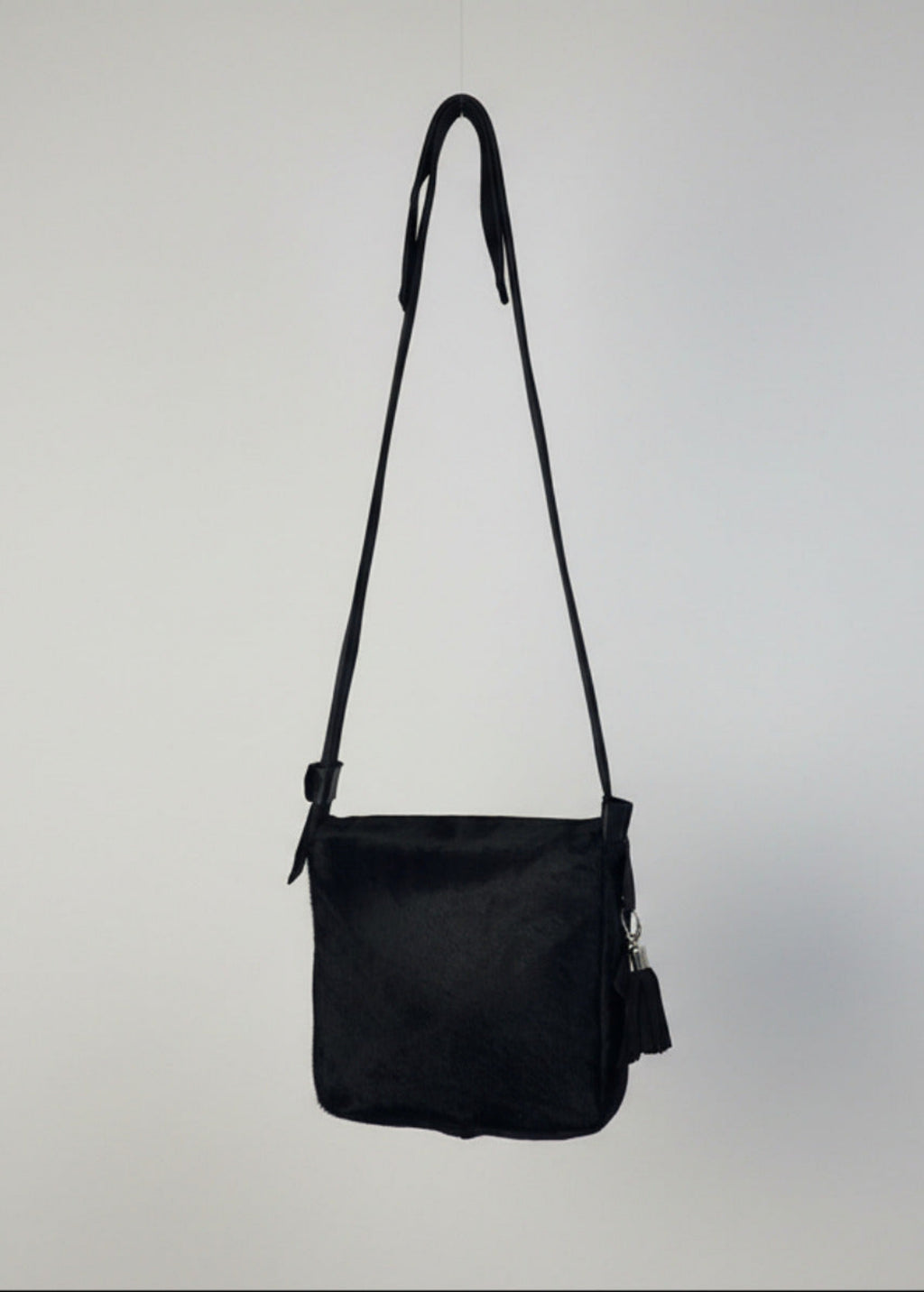 Stacy Stewart Smith Hair-On Calf Powder Satchel Bag floating back view gray background. 