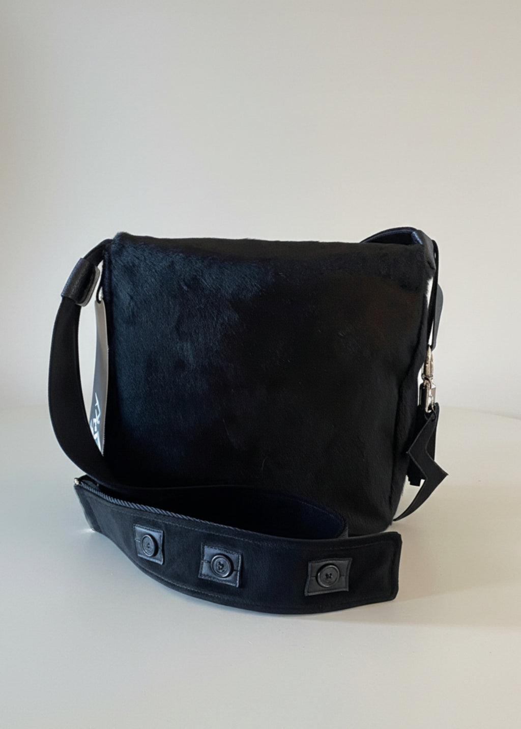 Stacy Stewart Smith Hair-On Calf Powder Satchel Bag back view gray background. 
