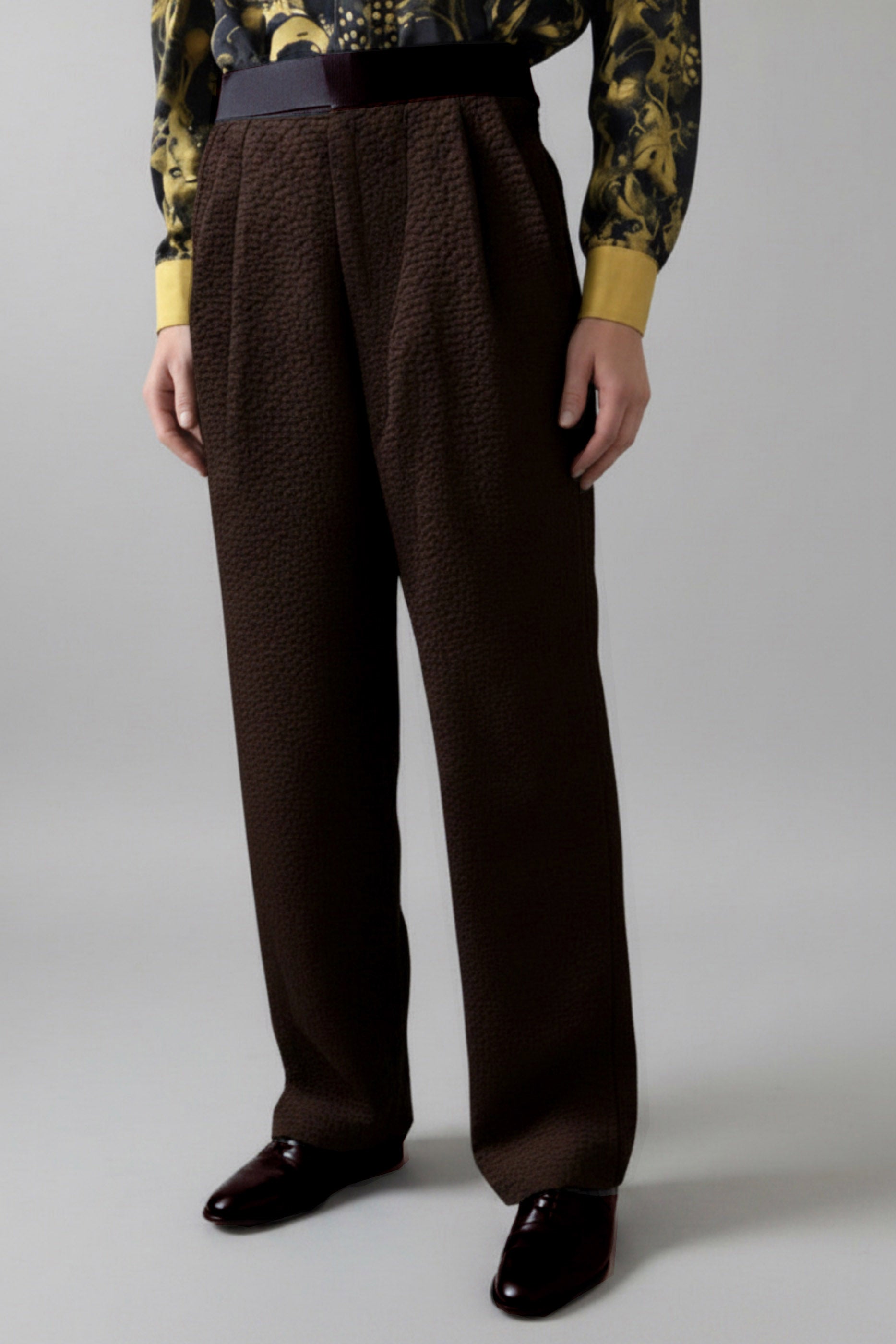 Stacy Stewart Smith Men's Espresso Faux Persian lamb pleated Windsor pants, shown on mannequin at 6'3