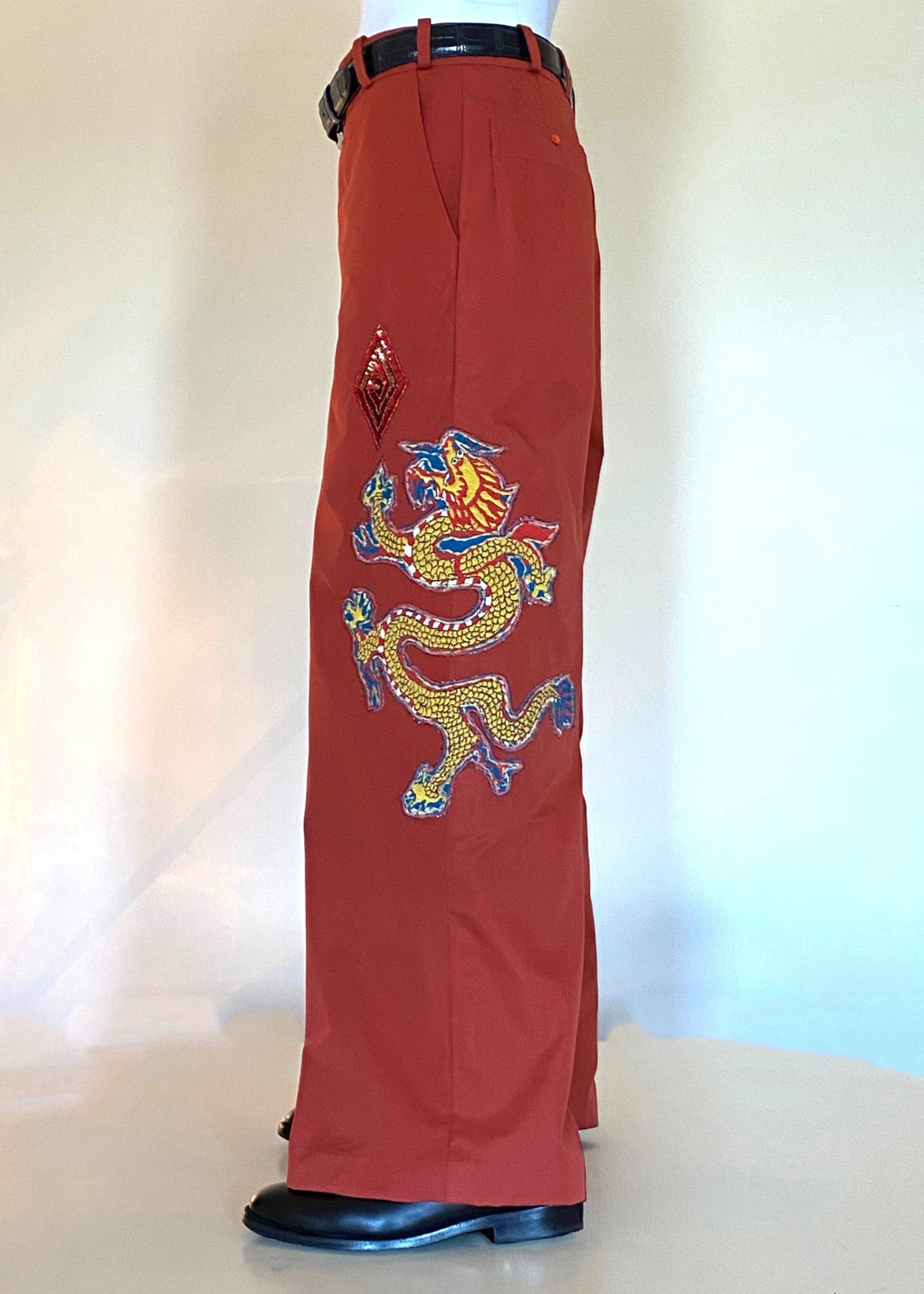 Stacy Stewart Smith Dragon & Ruby Flat Front Persimmon Cotton Twill Windsor Pants on a mannequin 6'3" left side view.