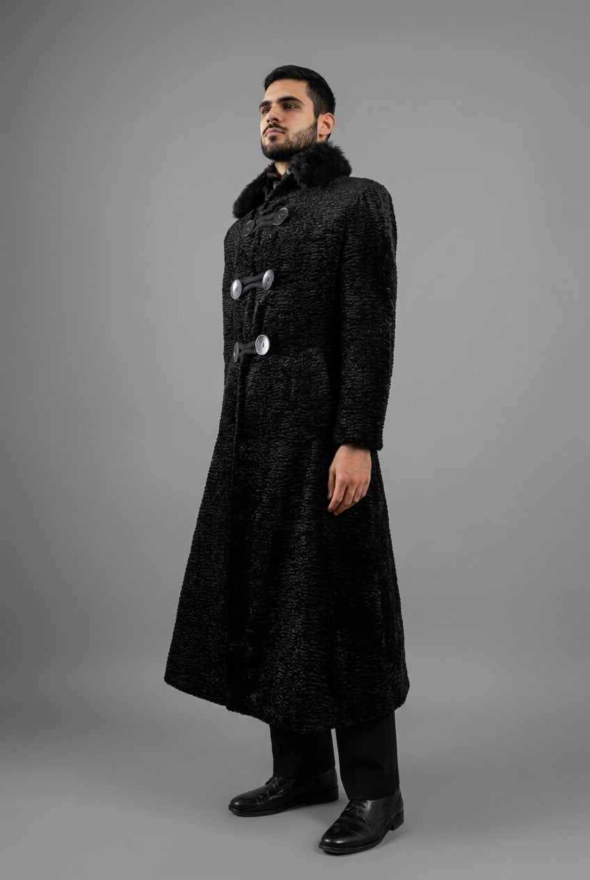 Stacy Stewart Smith Men's Grand Soir Montmartre Persian Lamb Coat with Detachable Shearling Collar, shown 3/4 frontal view on a mannequin 6'3" in a room with a wooden floor and an antique white wall.