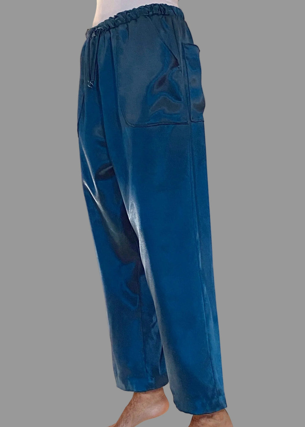 Stacy Stewart Smith Men's Blue Lagoon Satin Jiu-jitsu Pants on a mannequin 6'3" 3/4 view. 