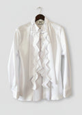Stacy Stewart Smith Men's Noble Innocent Satin Shirt on a hanger front view against antique white wall.