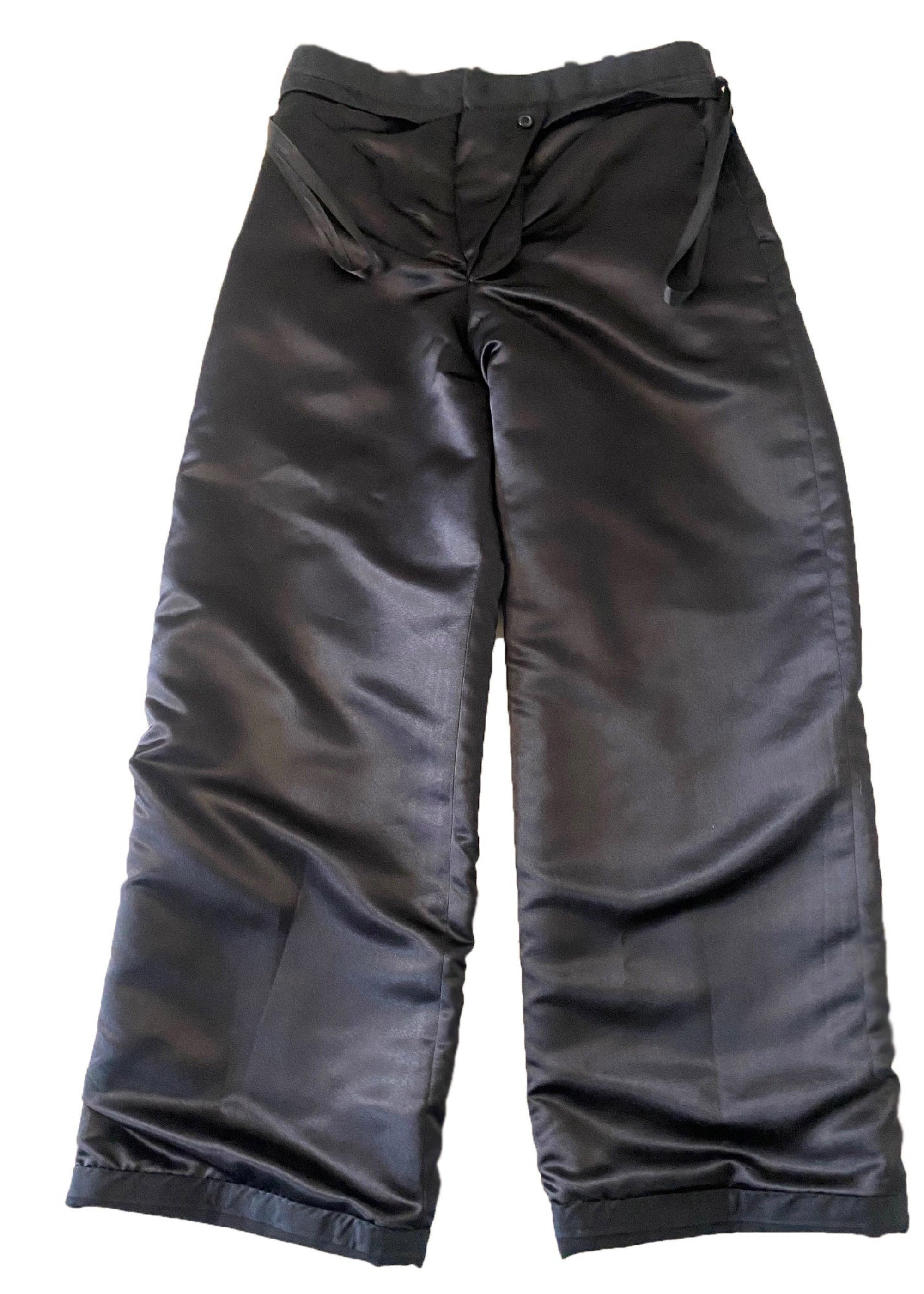 Stacy Stewart Smith Men's Black Knit Pleated Windsor Pants on mannequin 6'3" flat front lining view on white surface.