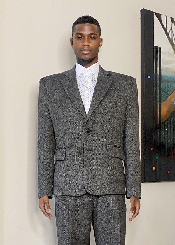 Stacy Stewart Smith Men's Diamond Dodger Tweed Notched Lapel Blazer on a mannequin 6'3" (front view) against an Antique White wall with a Stacy Stewart Smith oil painting hanging.