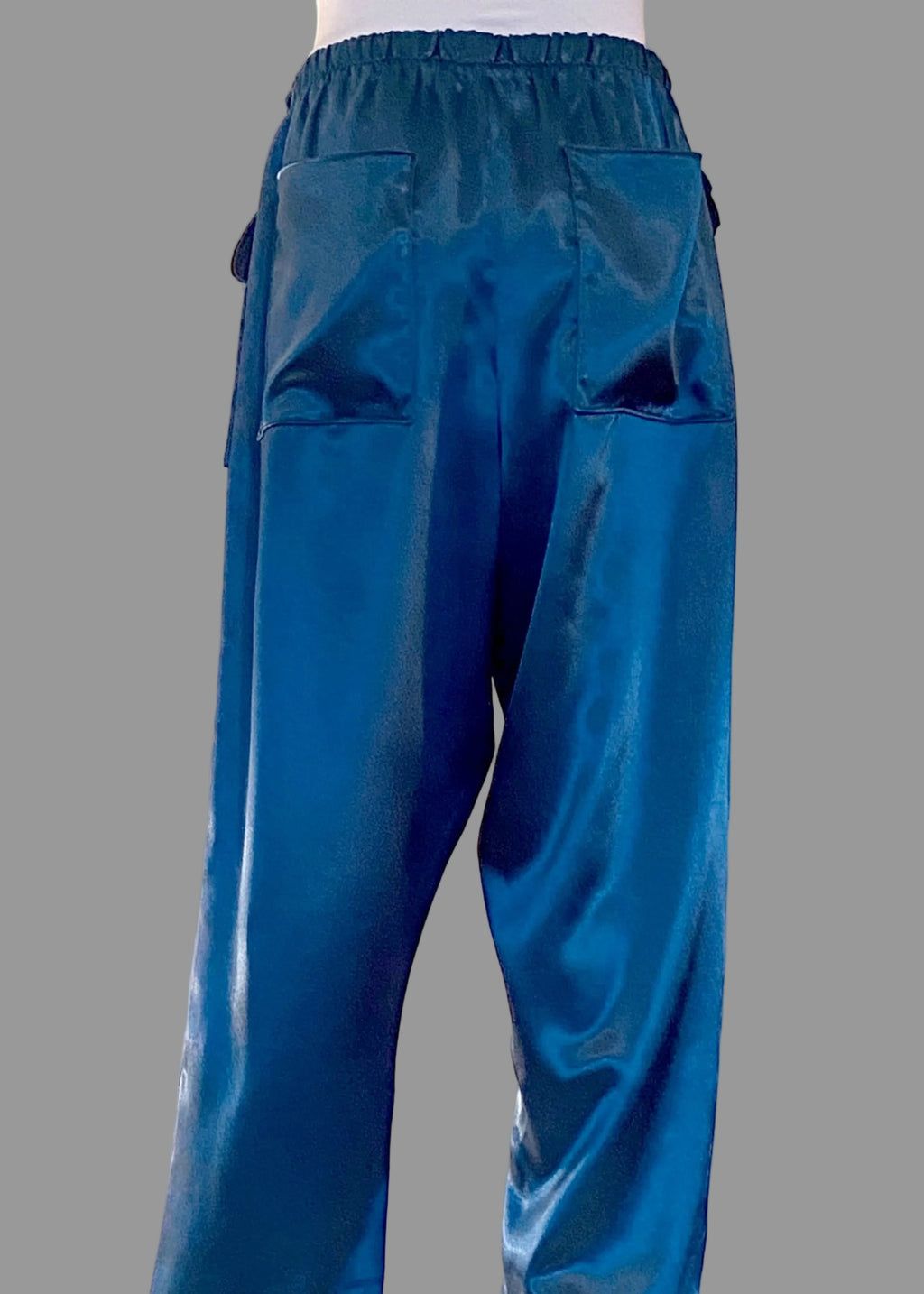 Stacy Stewart Smith Men's Blue Lagoon Satin Jiu-jitsu Pants on a mannequin 6'3" back view. 