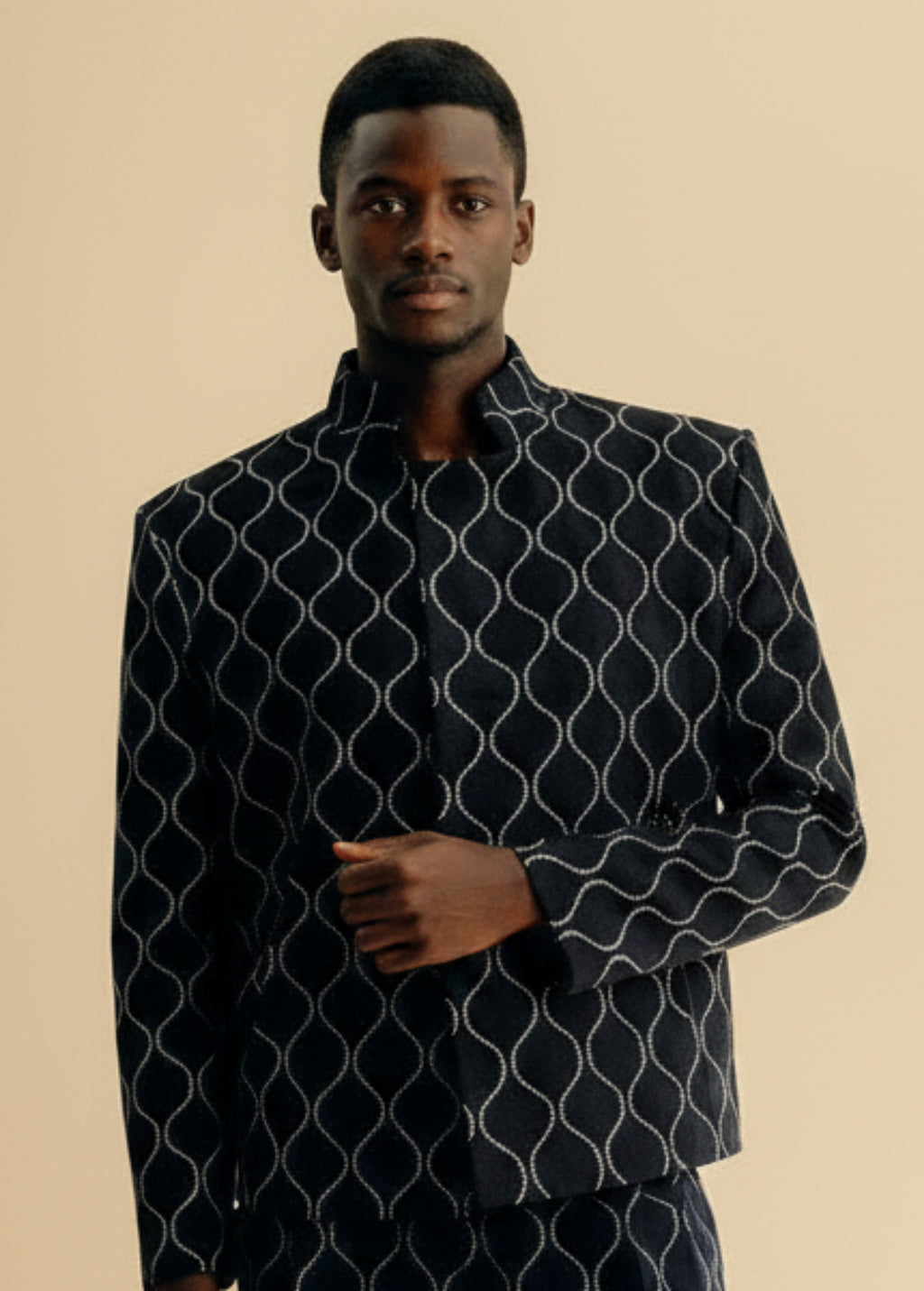 Stacy Stewart Smith Ogee Embroidered Raw Silk Flange-Back Moto Jacket on a mannequin 6'3" frontal jacket view and antique white background.