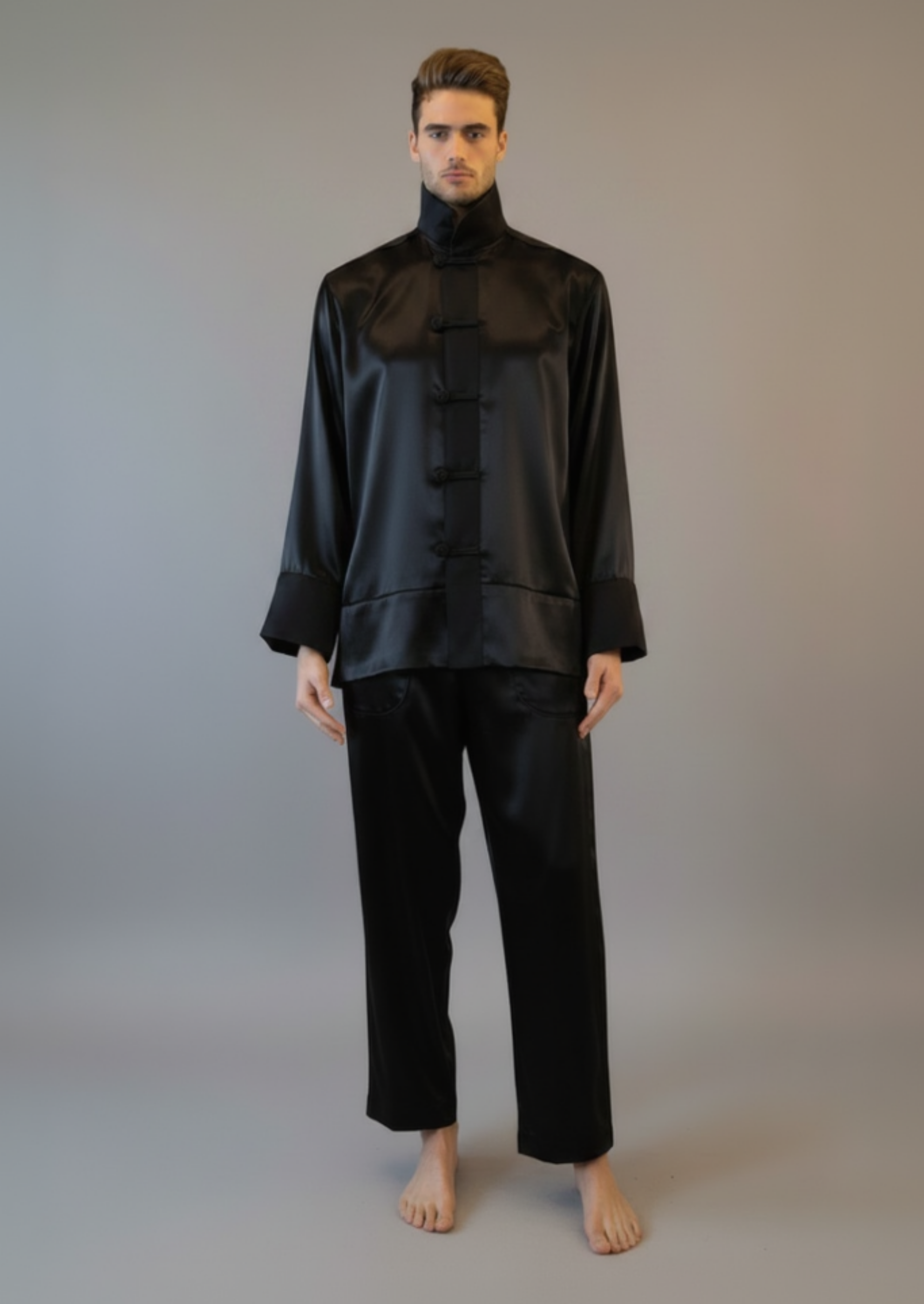Stacy Stewart Smith Men's Golden Tang Satin Lounge Set in all Black combo on a mannequin 6'3" closed with the collar up frontal view.