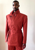 Sky & Ruby Trench-Jack persimmon front view collar up on a mannequin 6'3" in front of an antique white wall.