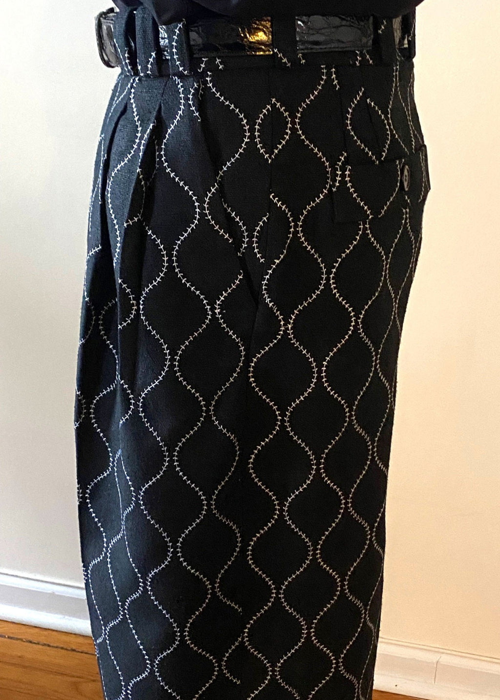 Stacy Stewart Smith Men's Ogee Embroidered Raw Silk Pleated Windsor Pants on a mannequin 6'3" zoomed left side view pants only.