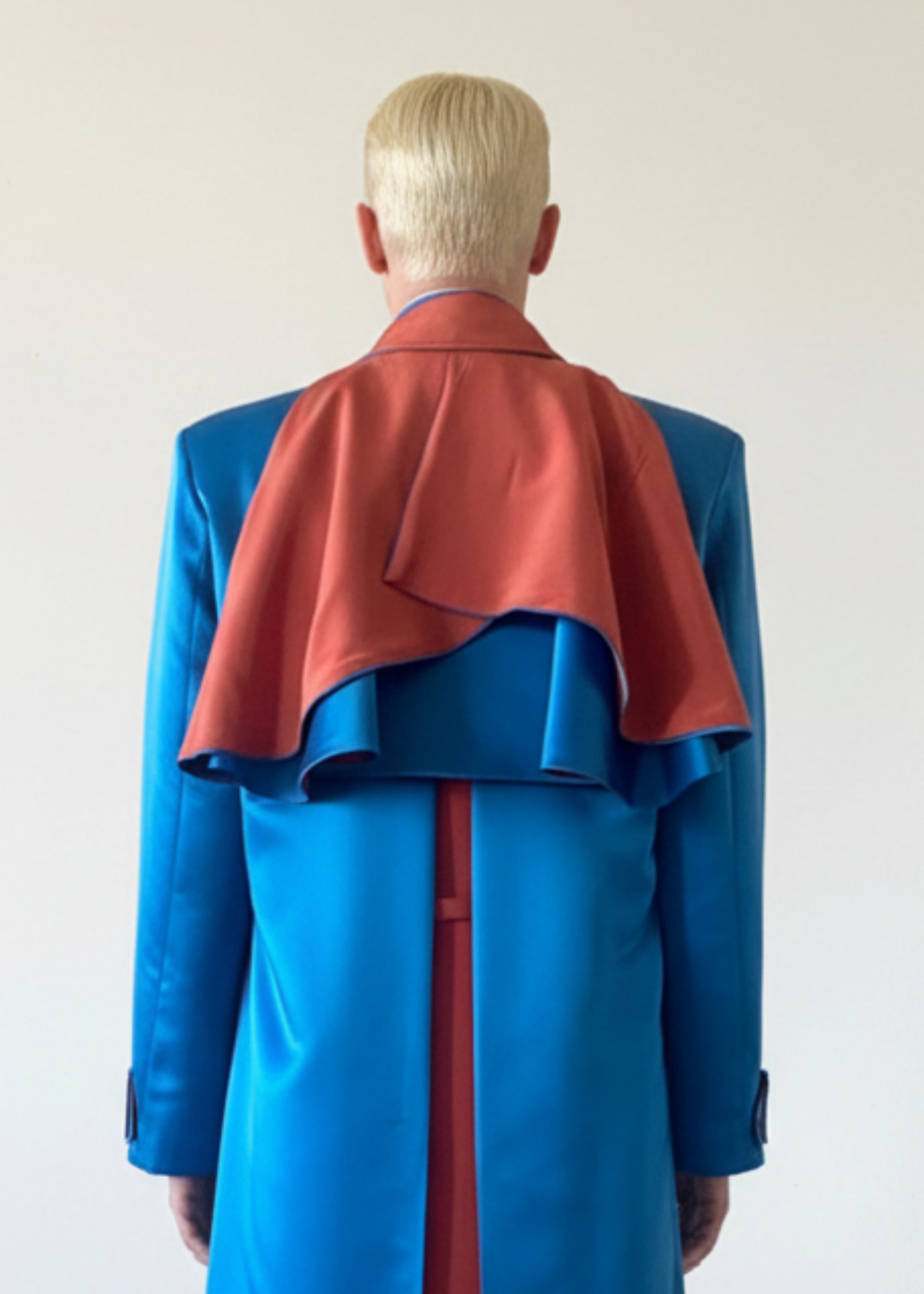 Stacy Stewart Smith Men's Baron Shower Coat on mannequin 6'3" closed with caplet buttoned in back under collar back view.