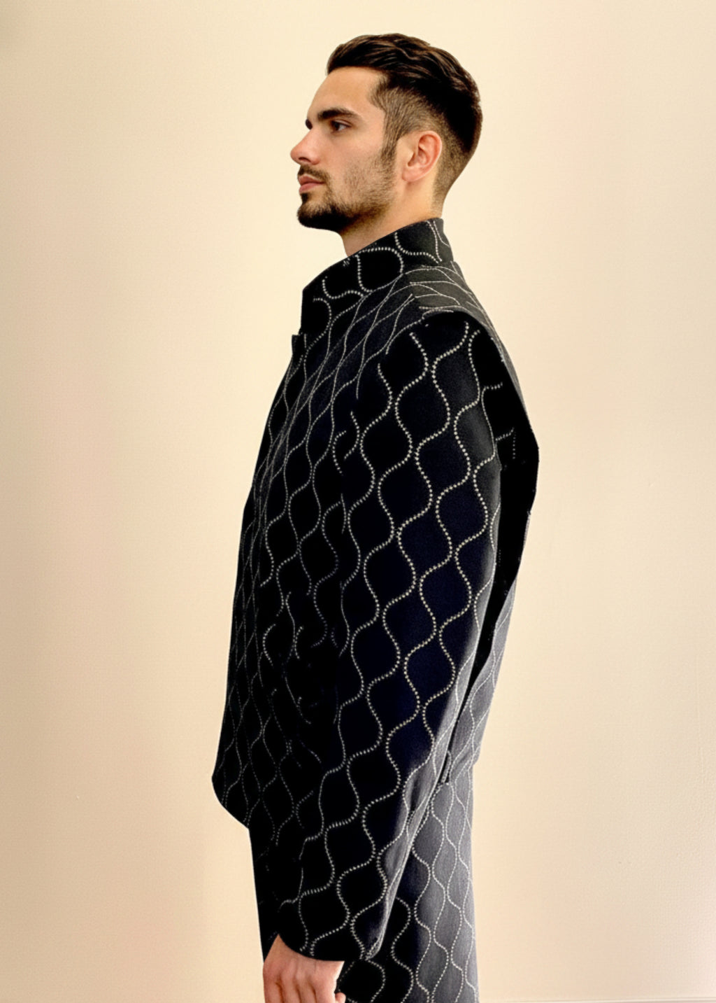 Stacy Stewart Smith Ogee Embroidered Raw Silk Flange-Back Moto Jacket on a mannequin 6'3" frontal side view and antique white background with wooden floor.