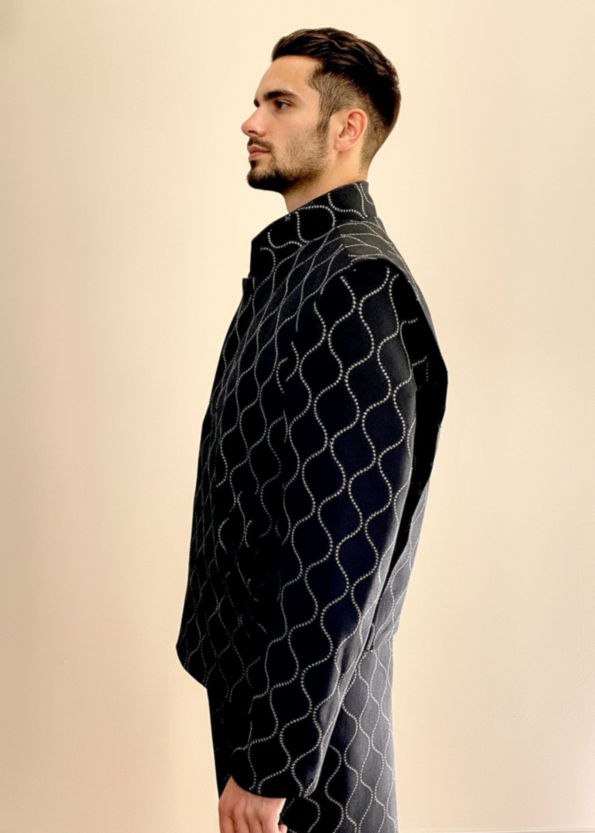 Stacy Stewart Smith Ogee Embroidered Raw Silk Flange-Back Moto Jacket on a mannequin 6'3" frontal side view and antique white background with wooden floor.