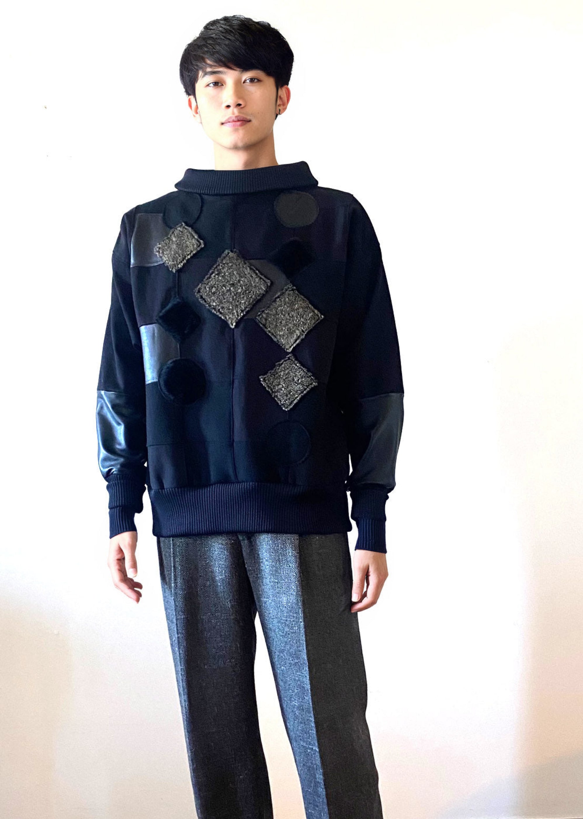 Stacy Stewart Smith Men's Black Harlequin Patch Sweatshirt on mannequin 6'3" frontal view mock neck down full front view against antique white wall. 