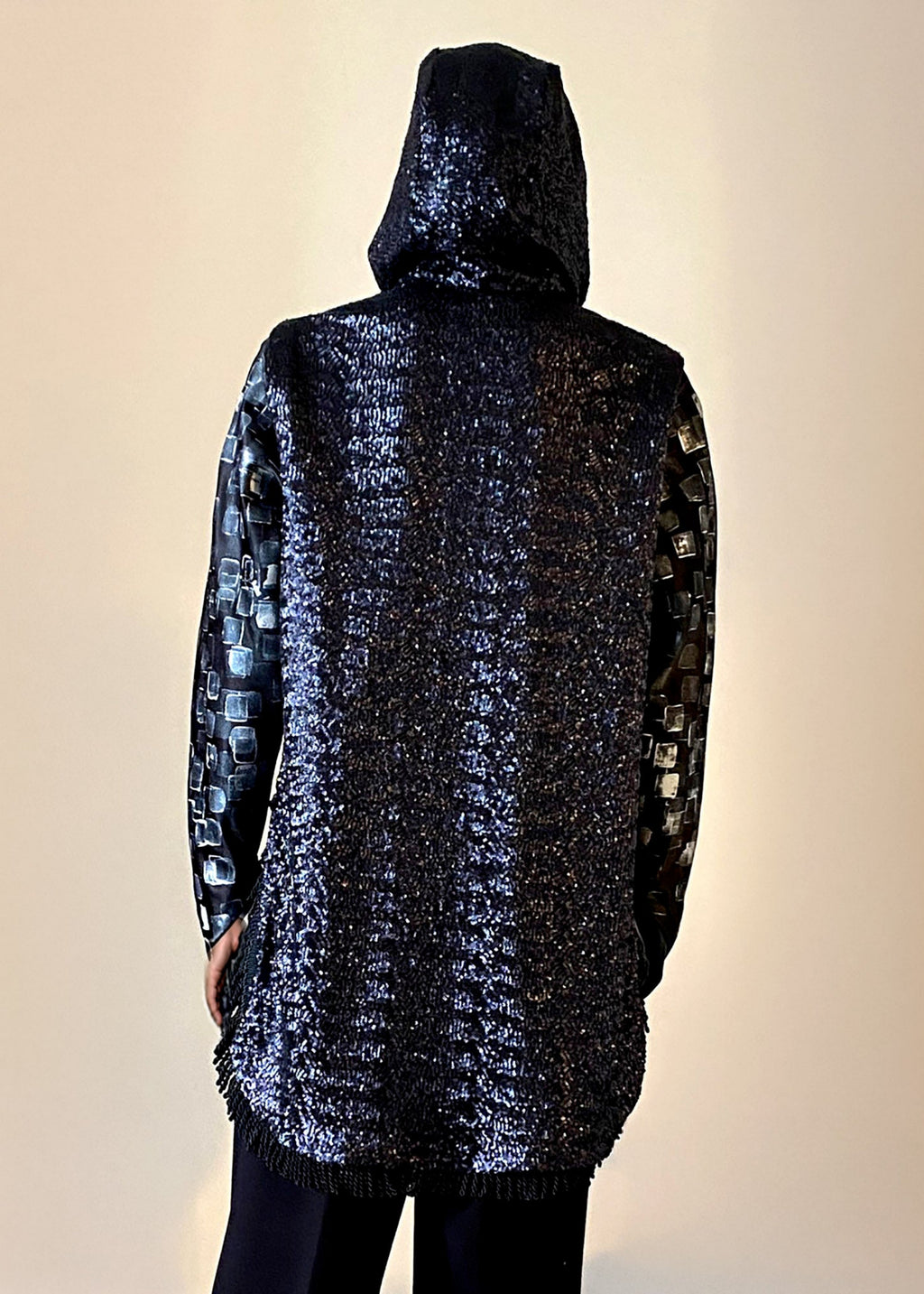 Stacy Stewart Smith Men’s Sequin and Hand-Printed Pixels Knight-Shirt on mannequin 6'3" zoomed back view with hood on.