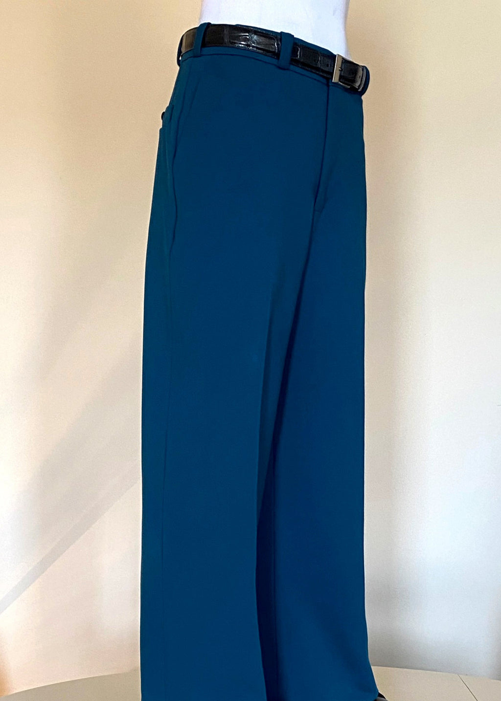 Stacy Stewart Smith Men's Blue Lagoon Teal Knit Flat Front Windsor Pants on mannequin 6'3" right 3/4 view.