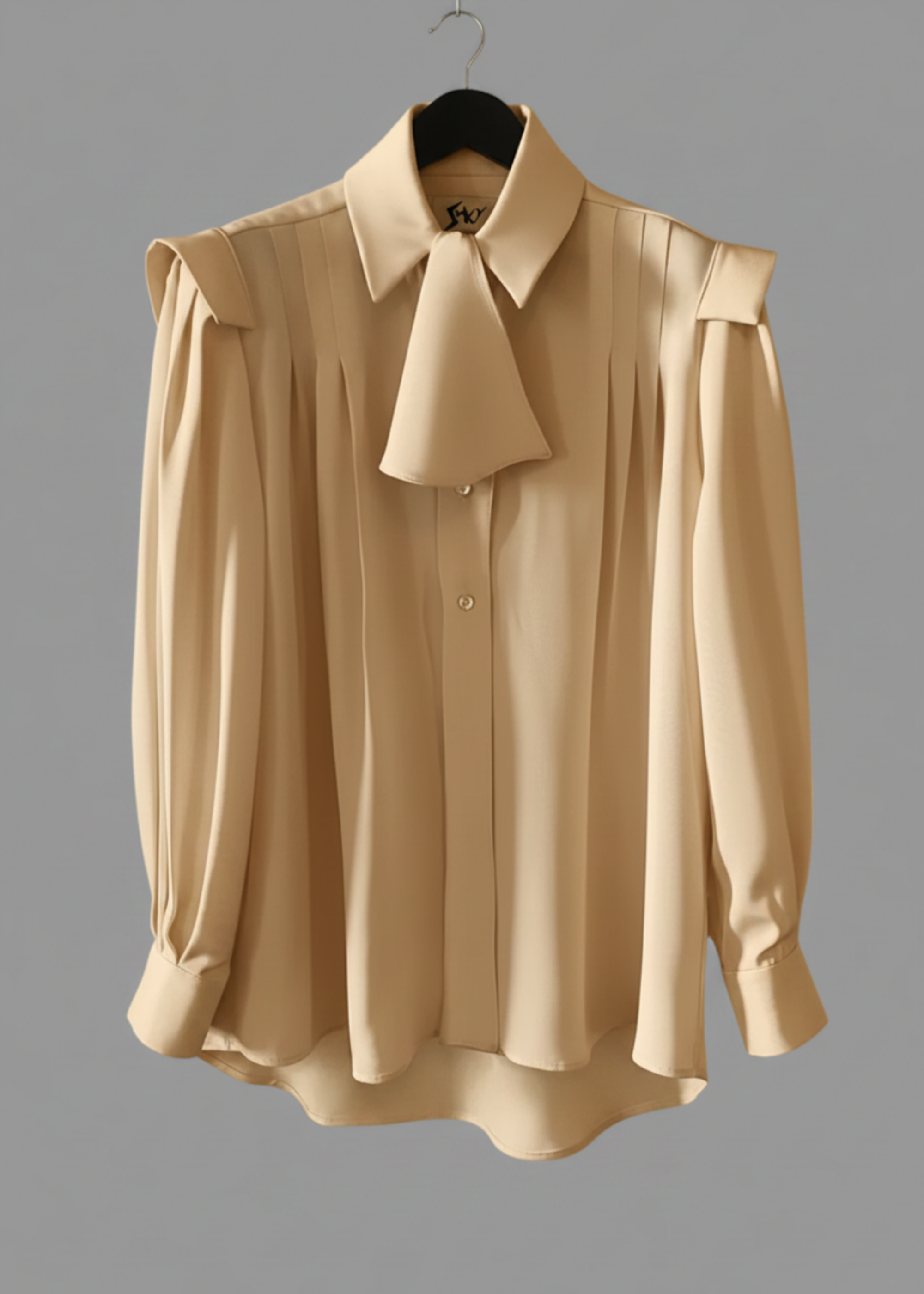 Stacy Stewart Smith Men's Poet Laureate Gold Silk Crepe Shirt on a hanger front flat view with jabot against gray backdrop.