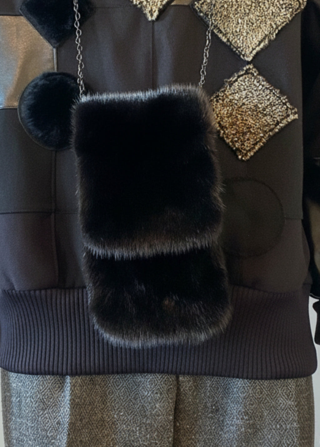 Stacy Stewart Smith Men's Black Gamma mink Sporran Pocket Bag front view hanging from male mannequin 6'3".
