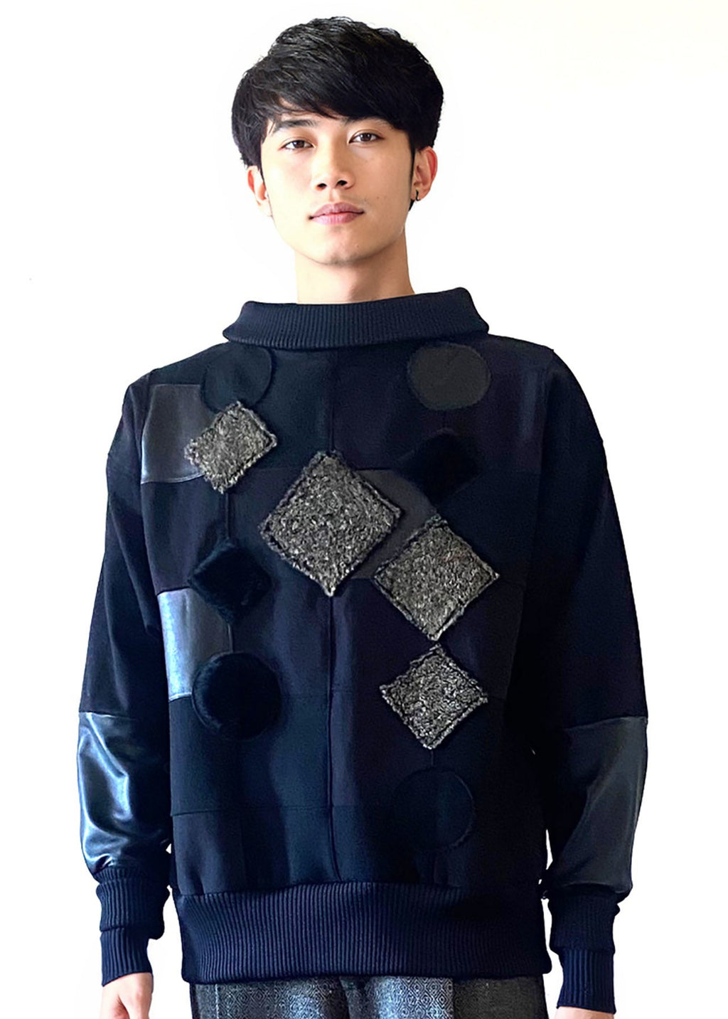 Stacy Stewart Smith Men's Black Harlequin Patch Sweatshirt on mannequin 6'3" zoomed frontal view mock neck down full front view against antique white wall. 