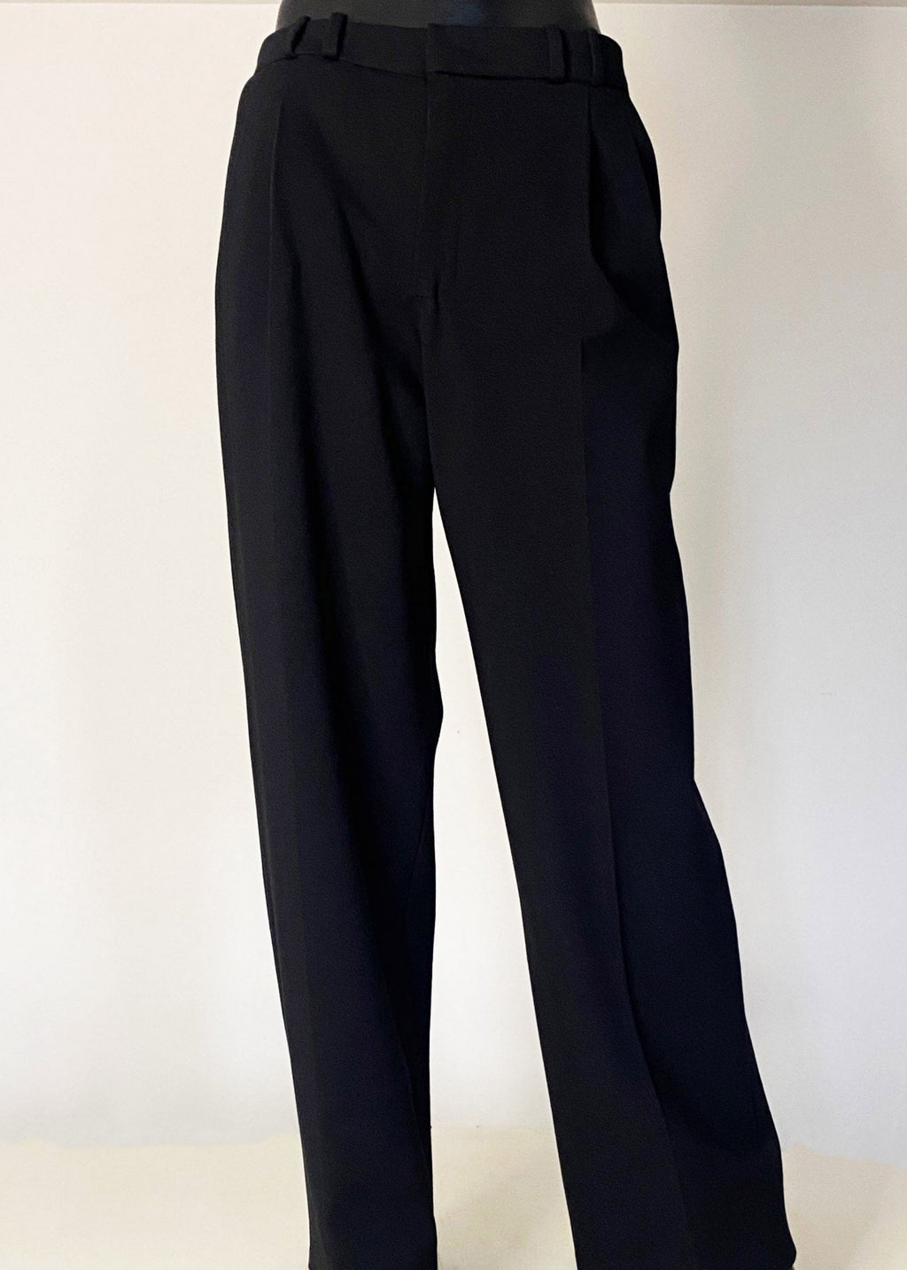 Stacy Stewart Smith Men's Black Knit Pleated Windsor Pants on mannequin 6'3" full front view with ivory backdrop. 