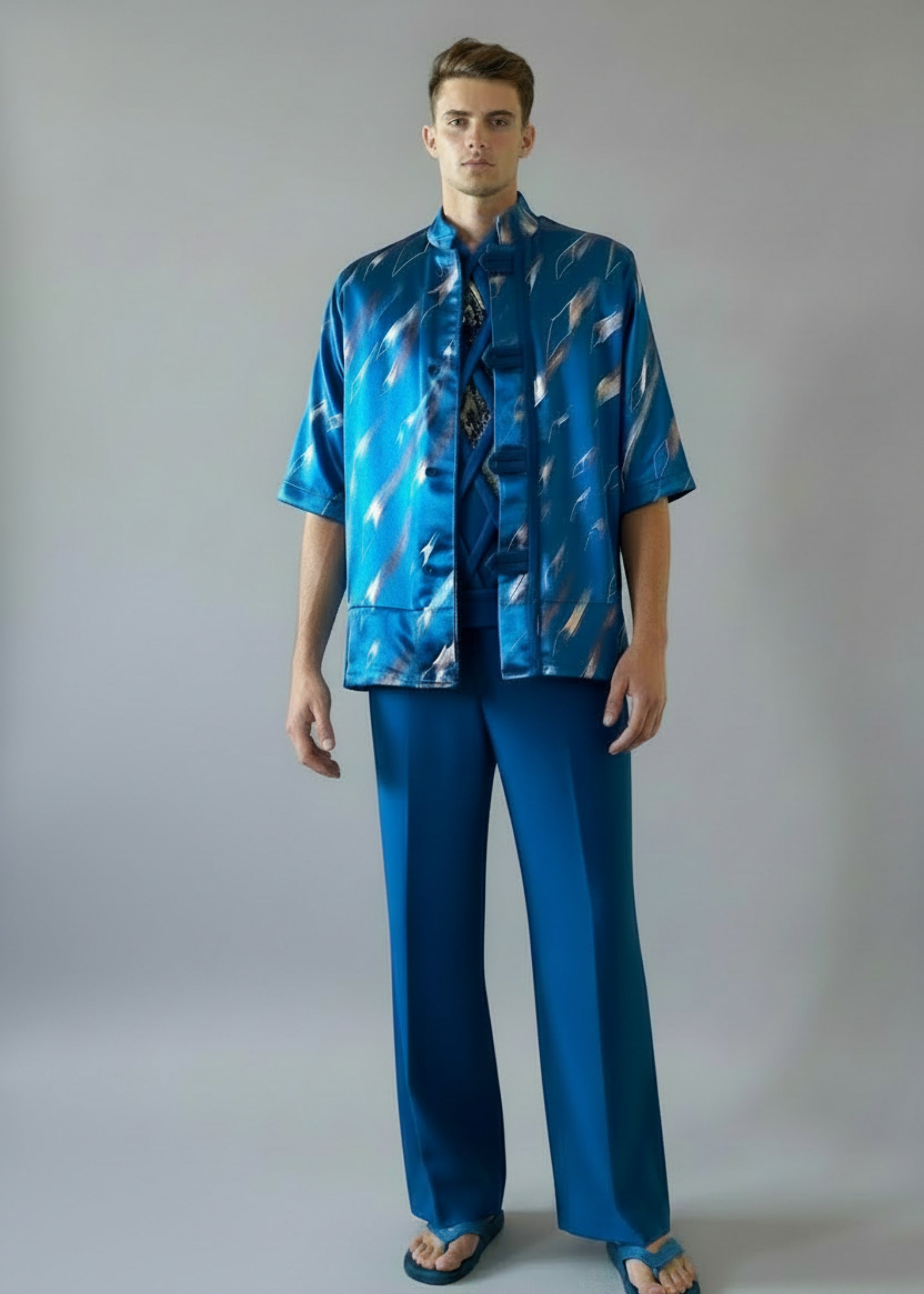 Stacy Stewart Smith Men's Rhombus Shower Hand-Painted Pool Shirt-Jacket on mannequin 6'3" frontal view with long blue pants.