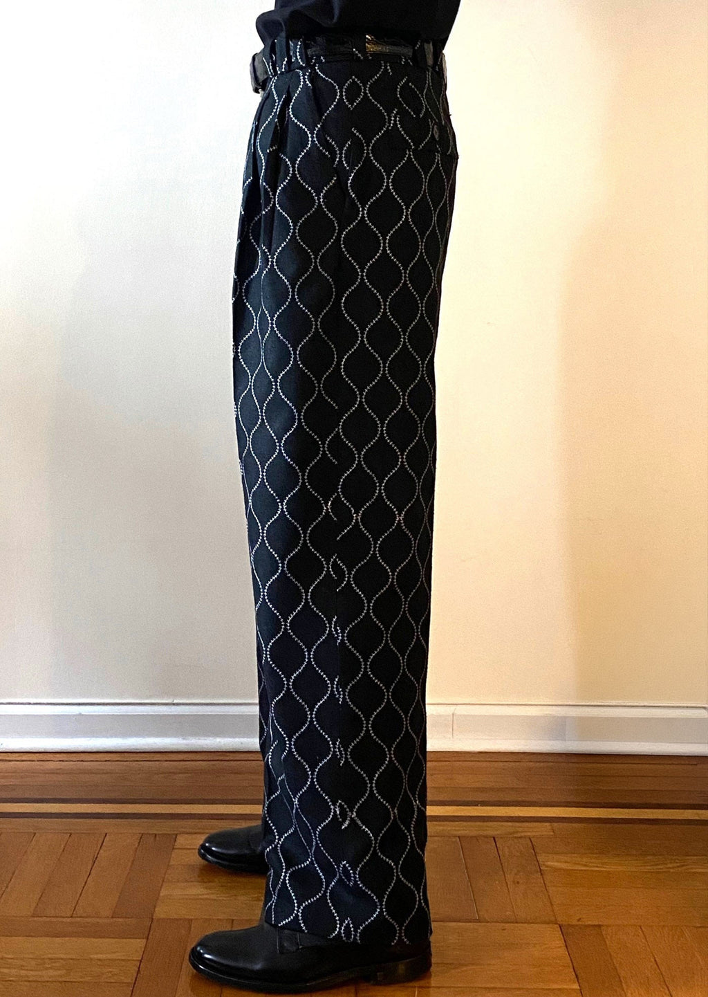 Stacy Stewart Smith Men's Ogee Embroidered Raw Silk Pleated Windsor Pants on a mannequin 6'3" side view pants only.