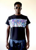 Stacy Stewart Smith Men's Black Dragon Scales Flange T-Shirt on mannequin 6'3" front view with pleated leather pants.