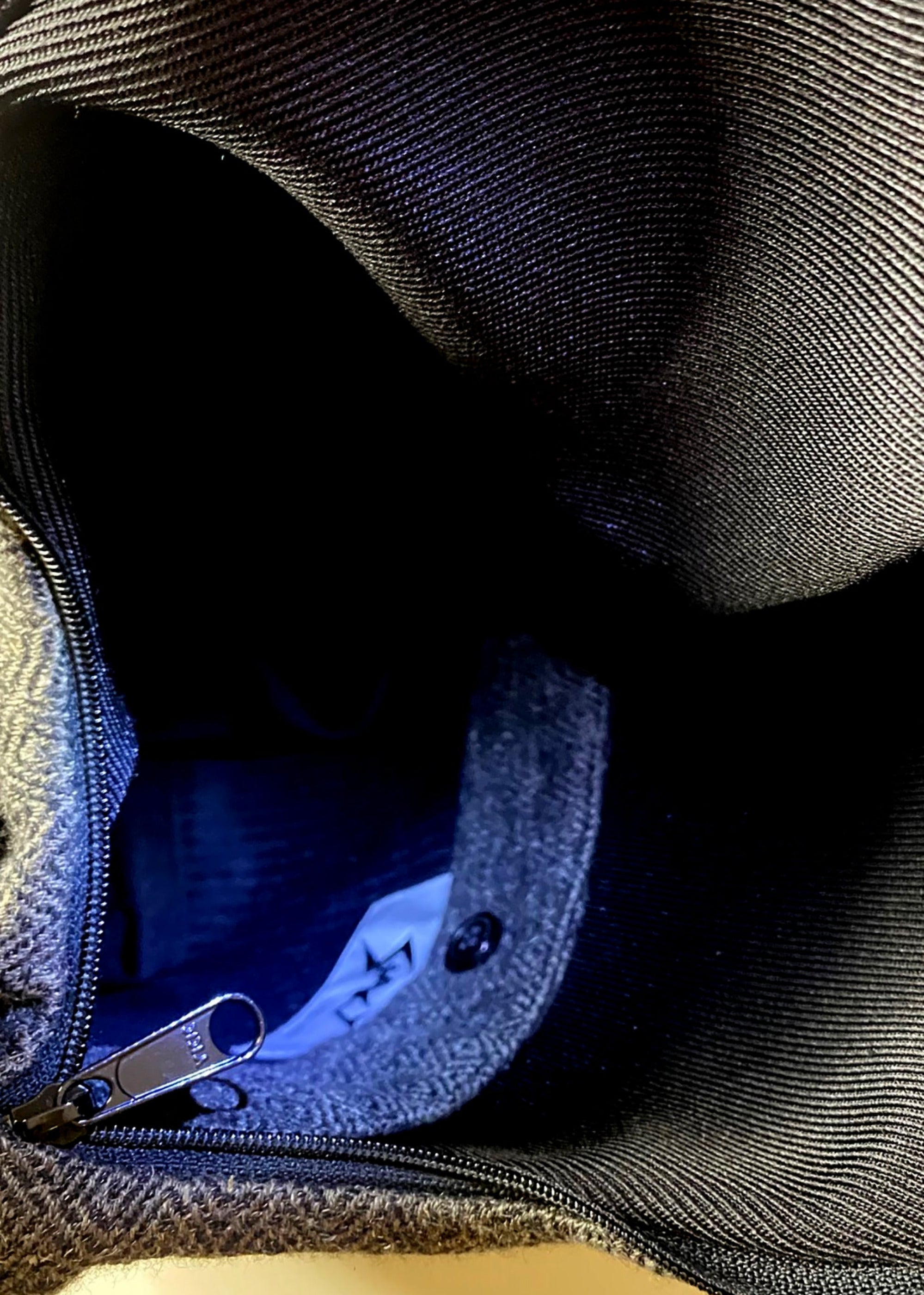 Stacy Stewart Smith Men's Diamond Dodger Tweed Newsie Sling Bag inside lining pocket and brand label view from top.