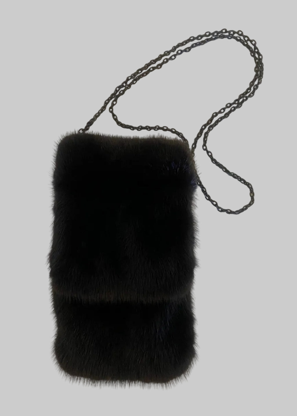 Stacy Stewart Smith Men's Black Gamma mink Sporran Pocket Bag flat front view with the flap closed showing on a gray surface.