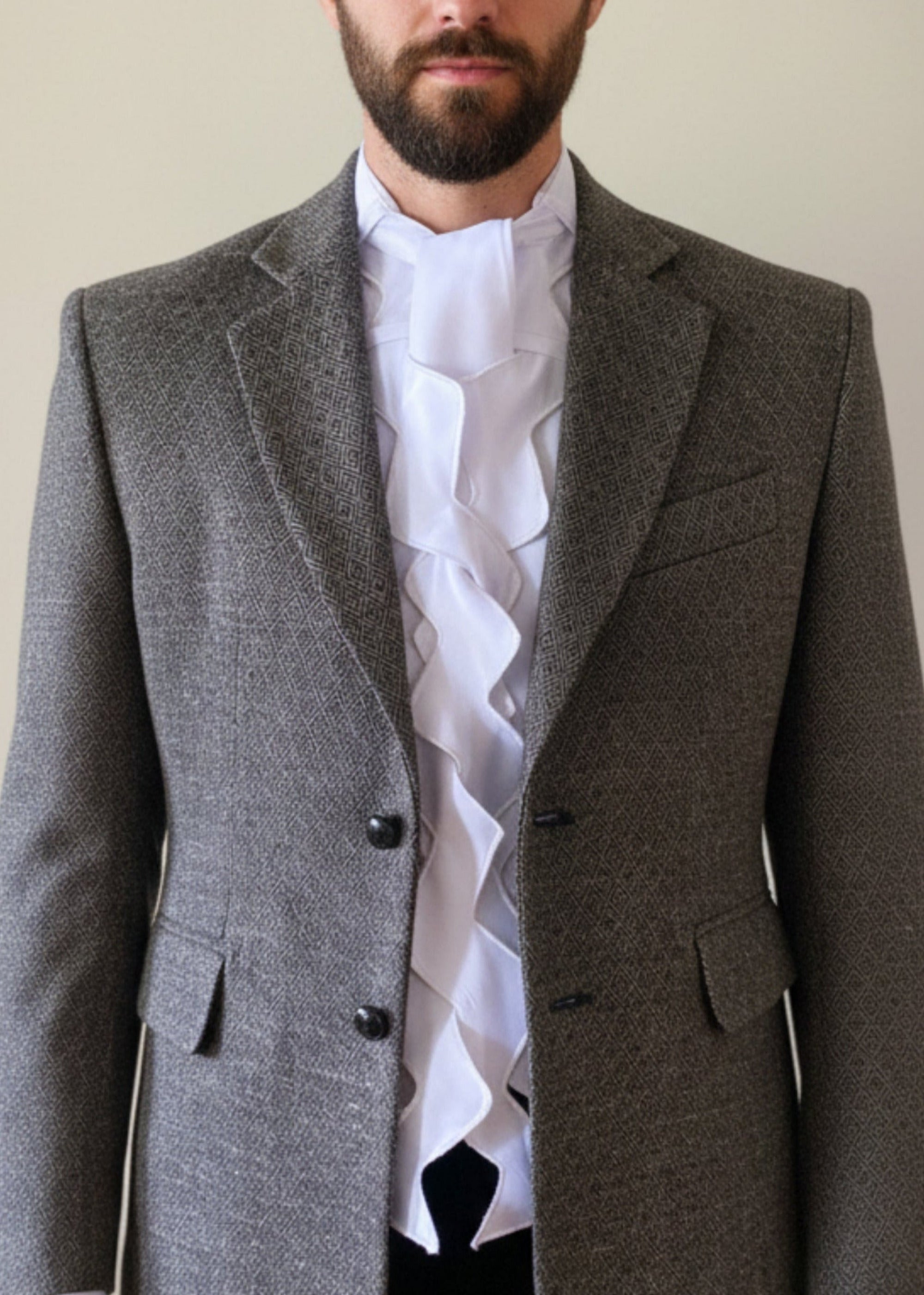 Stacy Stewart Smith Men's Noble Innocent Satin Shirt beneath his Diamond Dodger Tweed Blazer with black Suede pants on mannequin 6'3" against antique white wall.