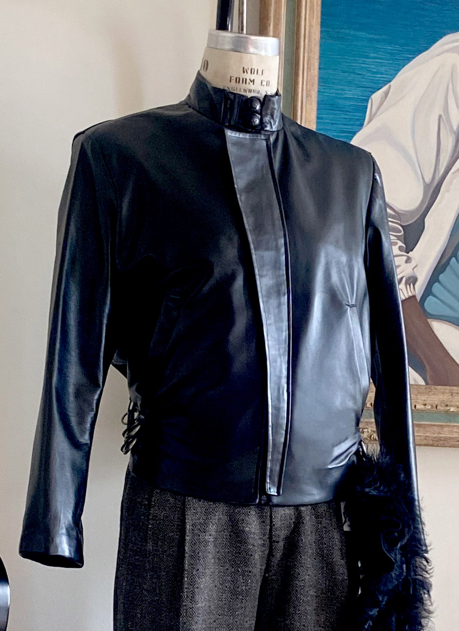Stacy Stewart Smith Men's Flange-Back Leather Moto Jacket  on a mannequin 6'3" front view. with Fall tweed pleated Windsor pants.