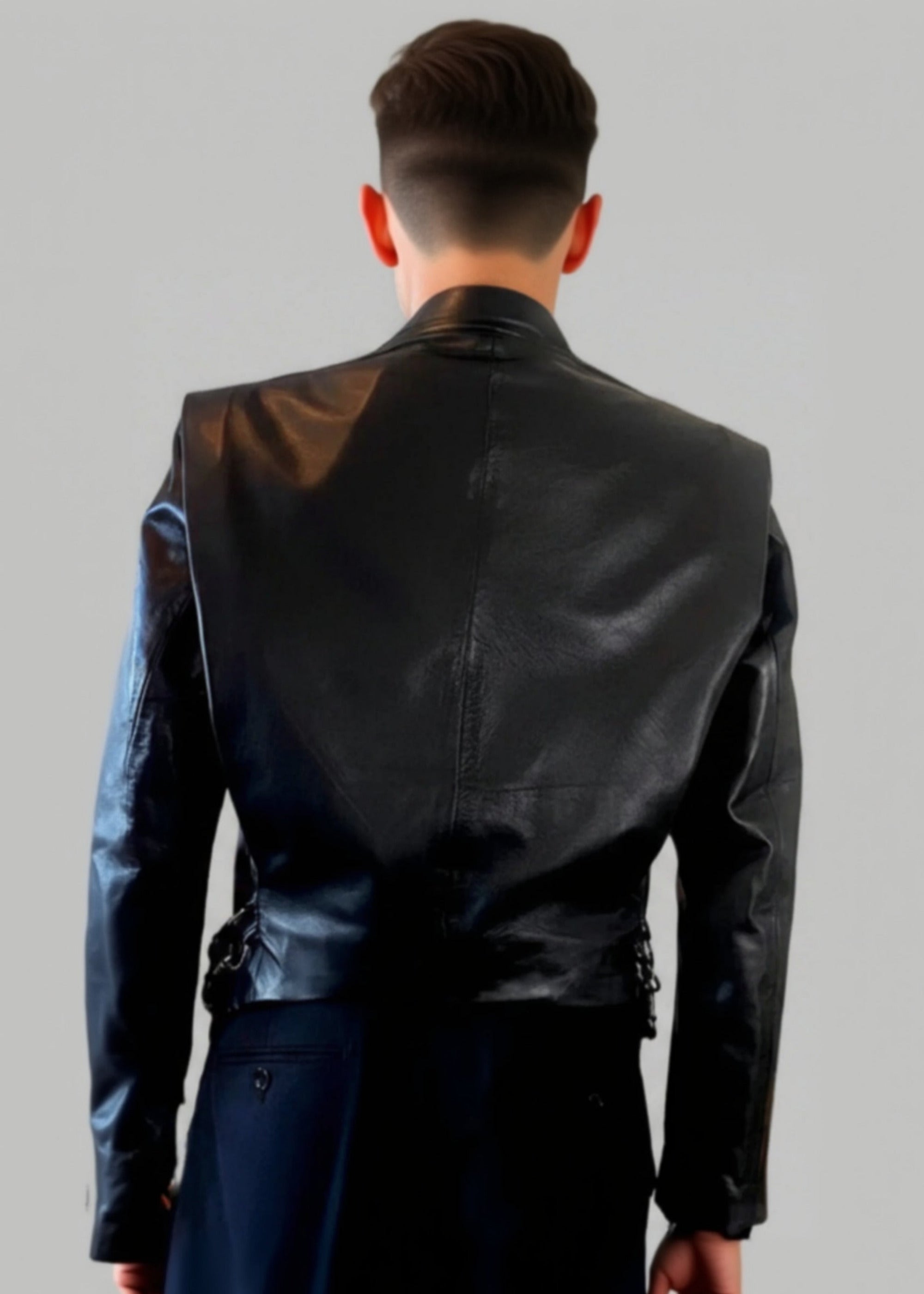 Stacy Stewart Smith Men's Flange-Back Leather Moto Jacket on a mannequin 6'3" back view against a gray background.