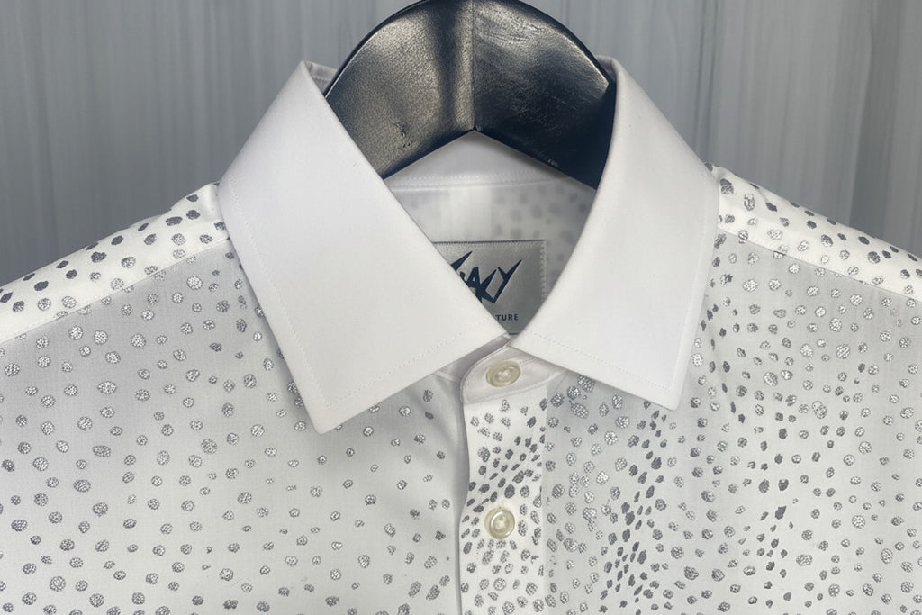 Stacy Stewart Smith Men's Silver Angels White Premium Cotton Percale Hand-Painted Shirt on a hanger zoomed collar front view with white mesh curtain backdrop.