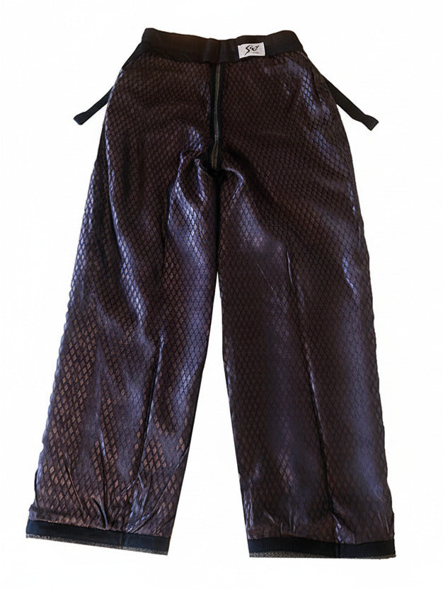 Stacy Stewart Smith Men's Diamond Dodger Tailored 3-Piece Tweed Suit back view inside  pants only with rhombus patterned acetate lining showing and brand labels on a white backdrop.