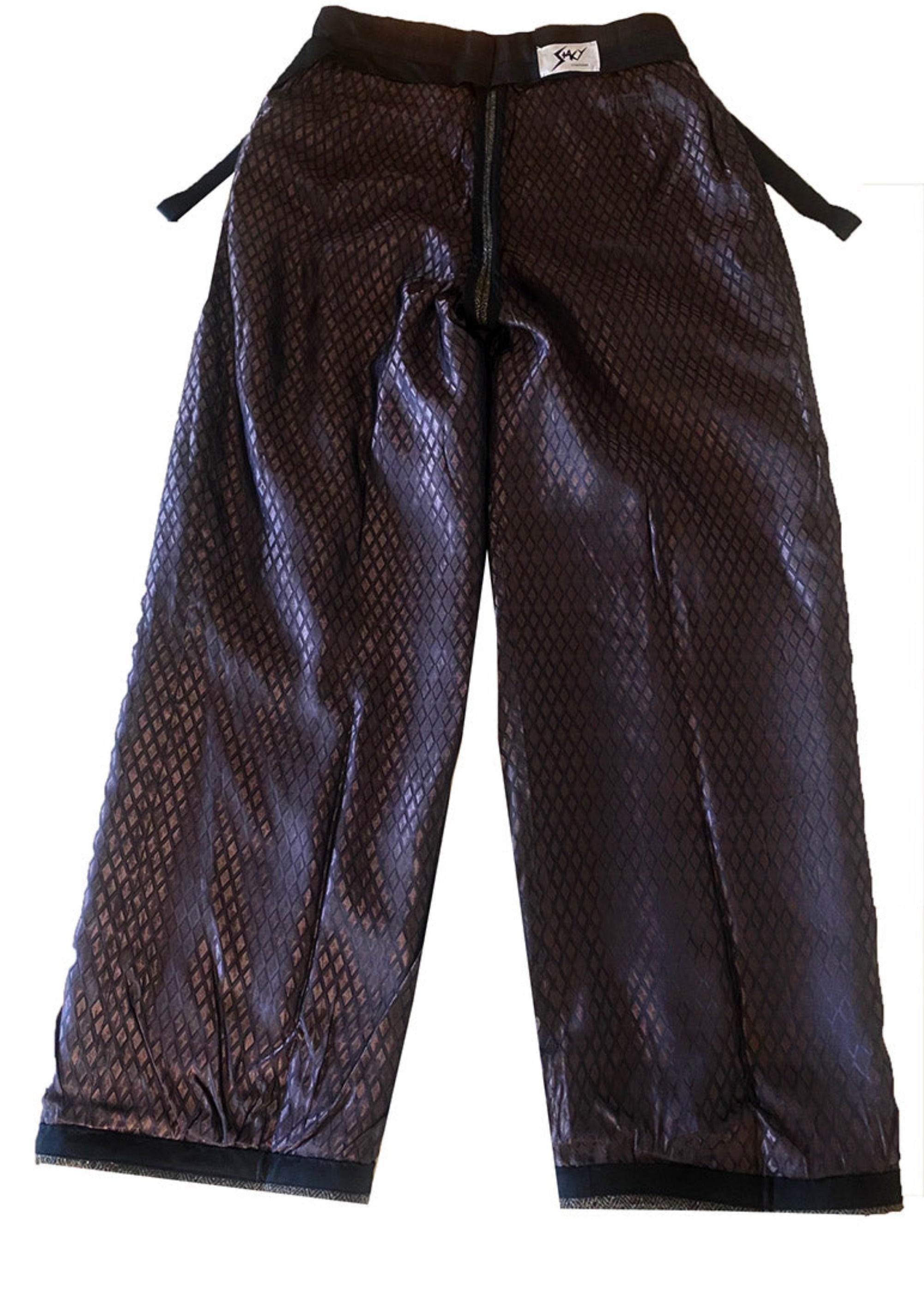 Stacy Stewart Smith Men's Highland Gentry Diamond Tweed Suit flat lining back view pants only on a white surface.