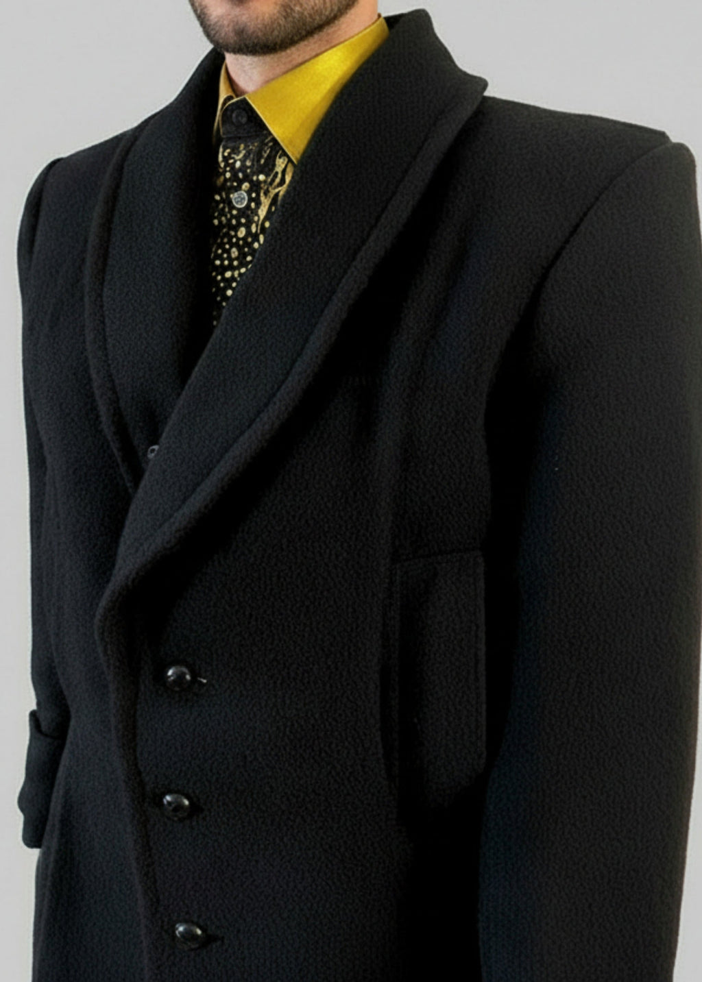Stacy Stewart Smith Men's Harris Tweed Wool Processional Great Coat on a mannequin 6'3" from frontal view without the fur collar with a gray background.