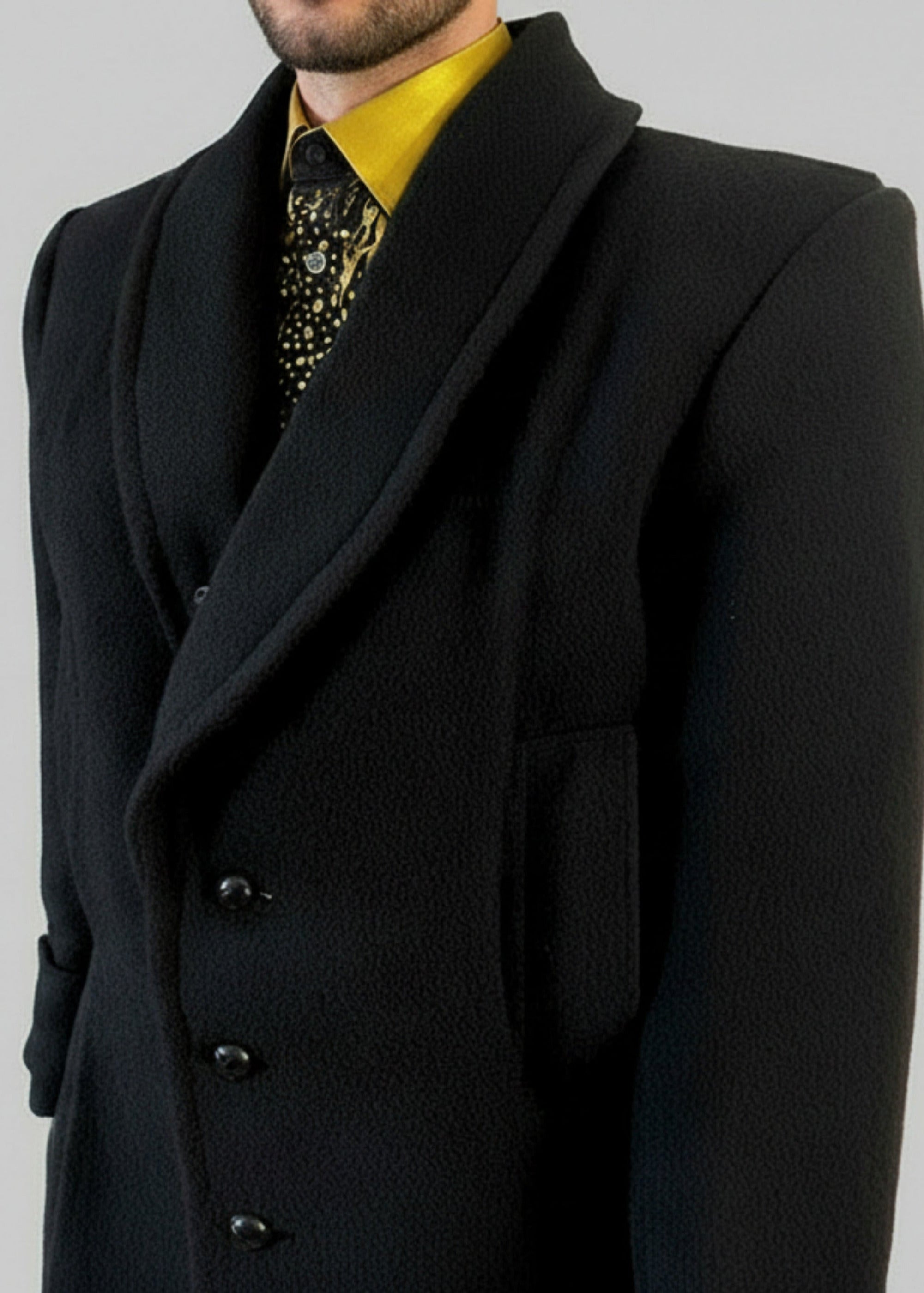 Stacy Stewart Smith Men's Harris Tweed Wool Processional Great Coat on a mannequin 6'3" from frontal view without the fur collar with a gray background.