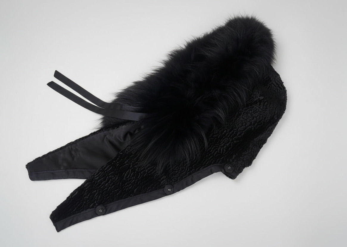 Stacy Stewart Smith Men's Black Knight Faux Persian Lamb Coat in Coal Black, detached hood side view on white surface