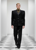 Stacy Stewart smith Onyx Grand Soir Tuxedo Ensemble on a mannequin 6'3" walking in a fashion show with checked floor and white entrance.