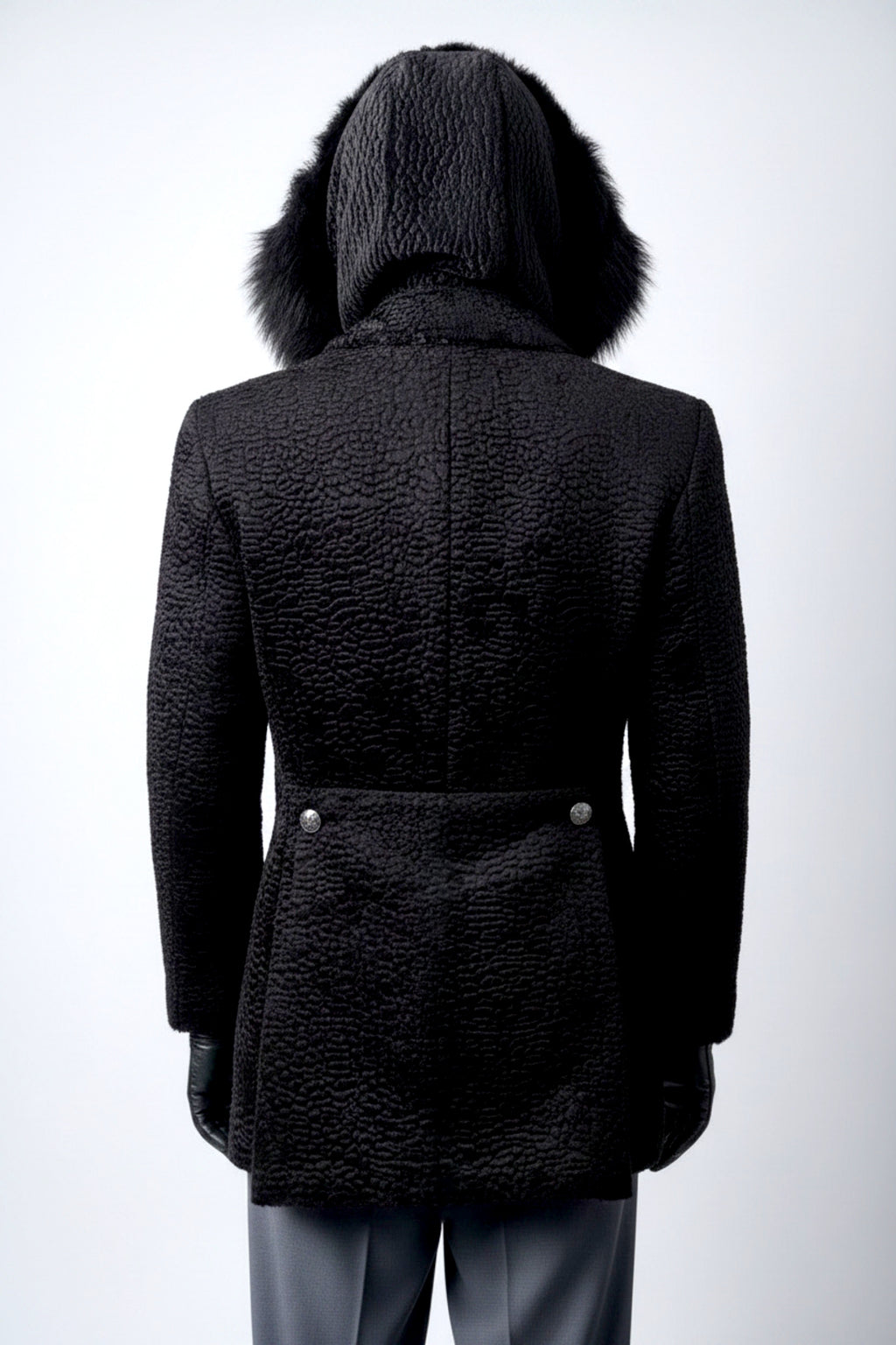 Stacy Stewart Smith Men's Black Knight Faux Persian Lamb Coat in Coal Black, back view shown with hood up on mannequin at 6'3