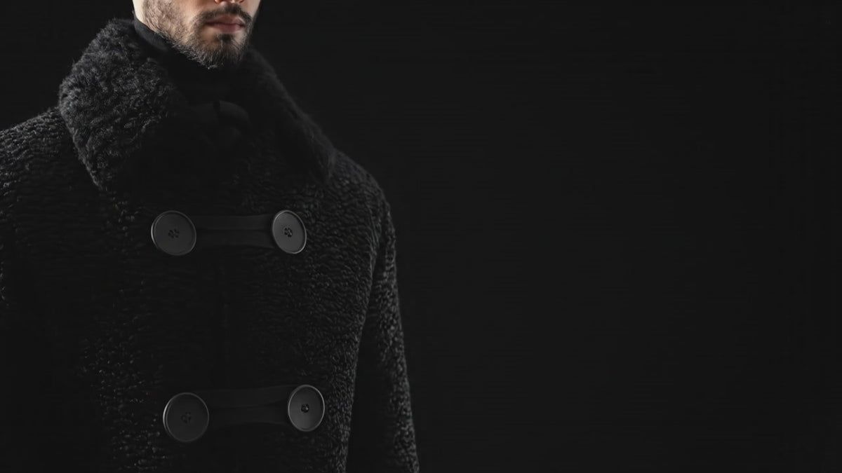 Close up video of Stacy Stewart Smith Men's Grand Soir Montmartre Persian Lamb Coat with Detachable Shearling Collar, shown front view on a mannequin at 6'3